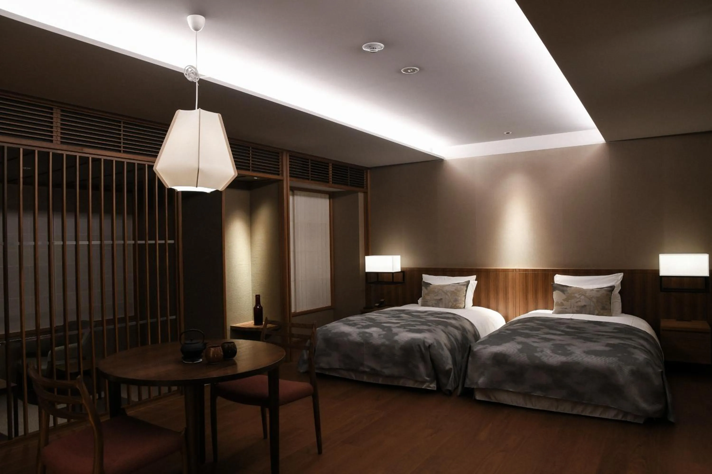 Bed in THE HIRAMATSU KYOTO