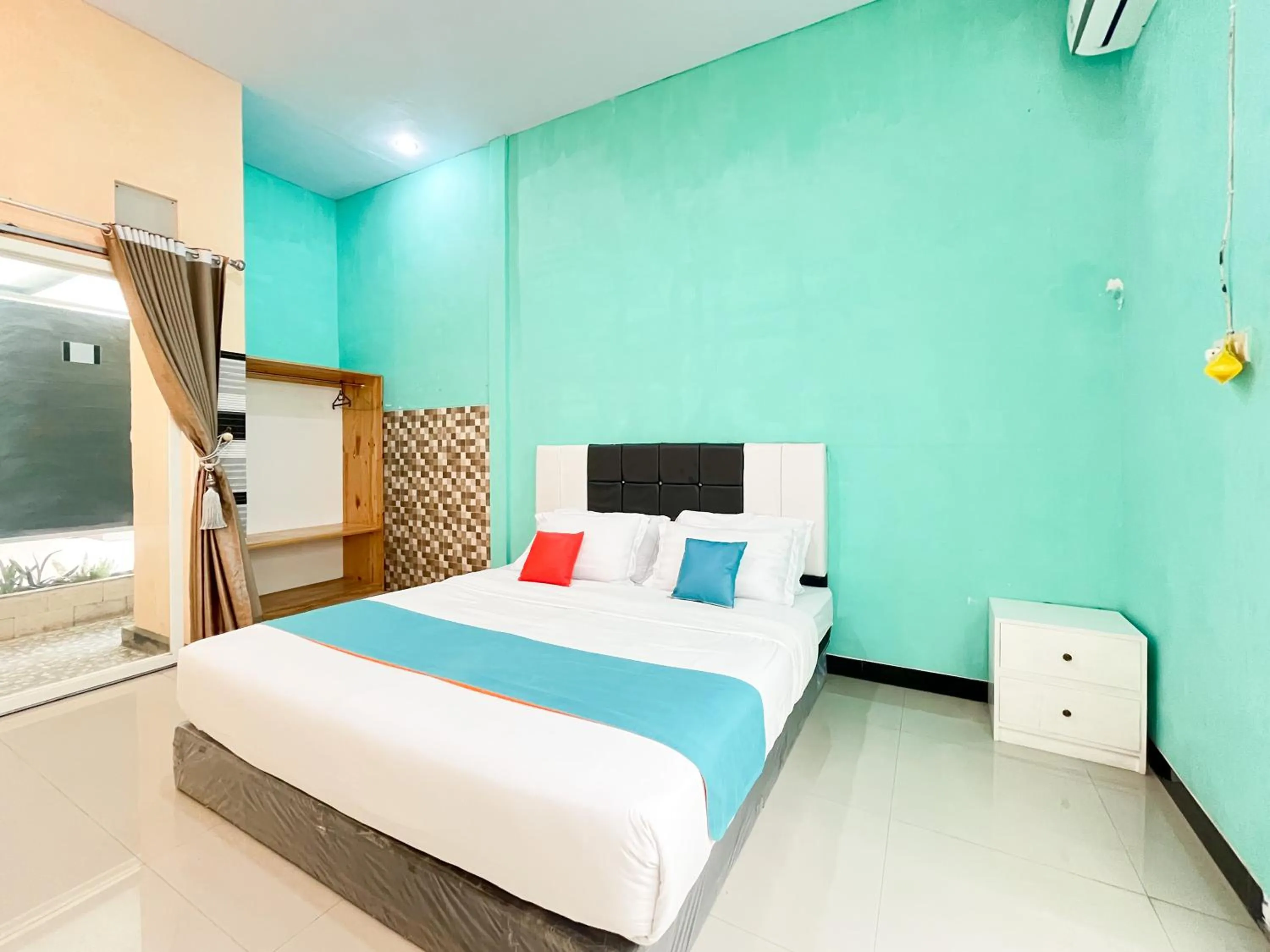 Bedroom, Bed in Sans Borobudur Homestay Banyuwangi