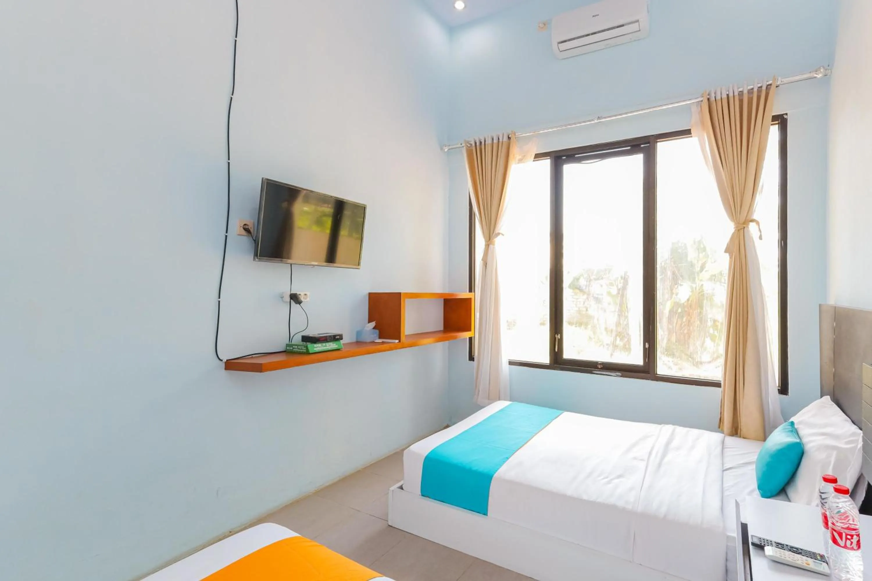 Bedroom, Bed in Sans Borobudur Homestay Banyuwangi