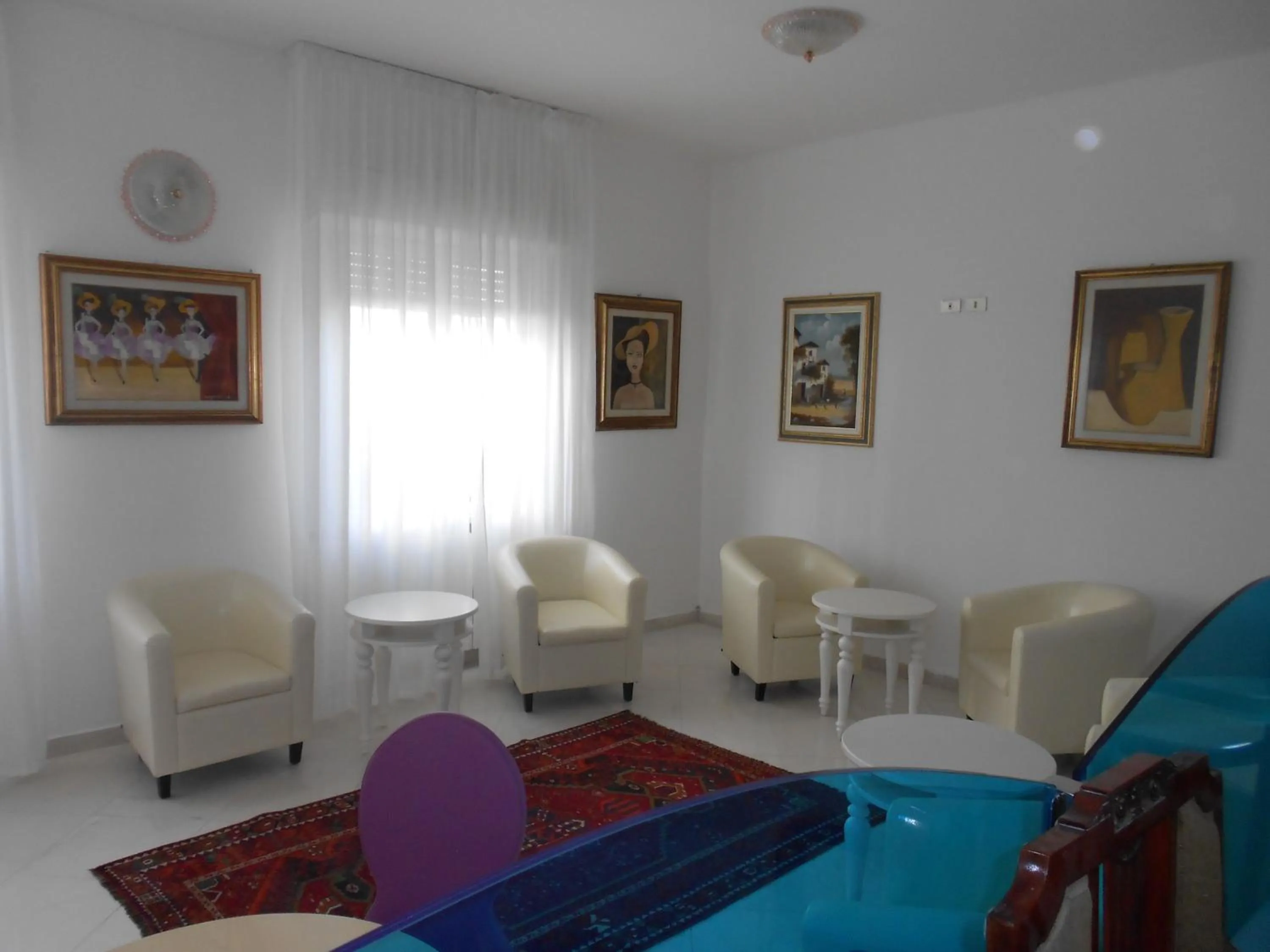 Communal lounge/ TV room in Hotel Laguna Blu