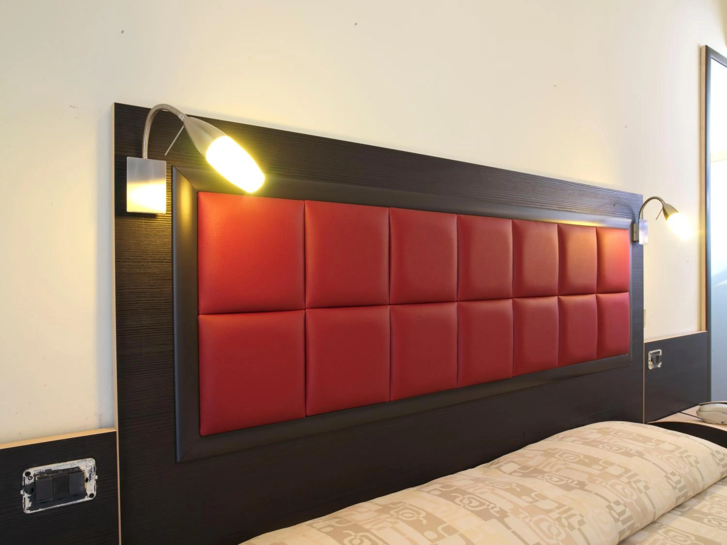 Decorative detail, Bed in Hotel Arno