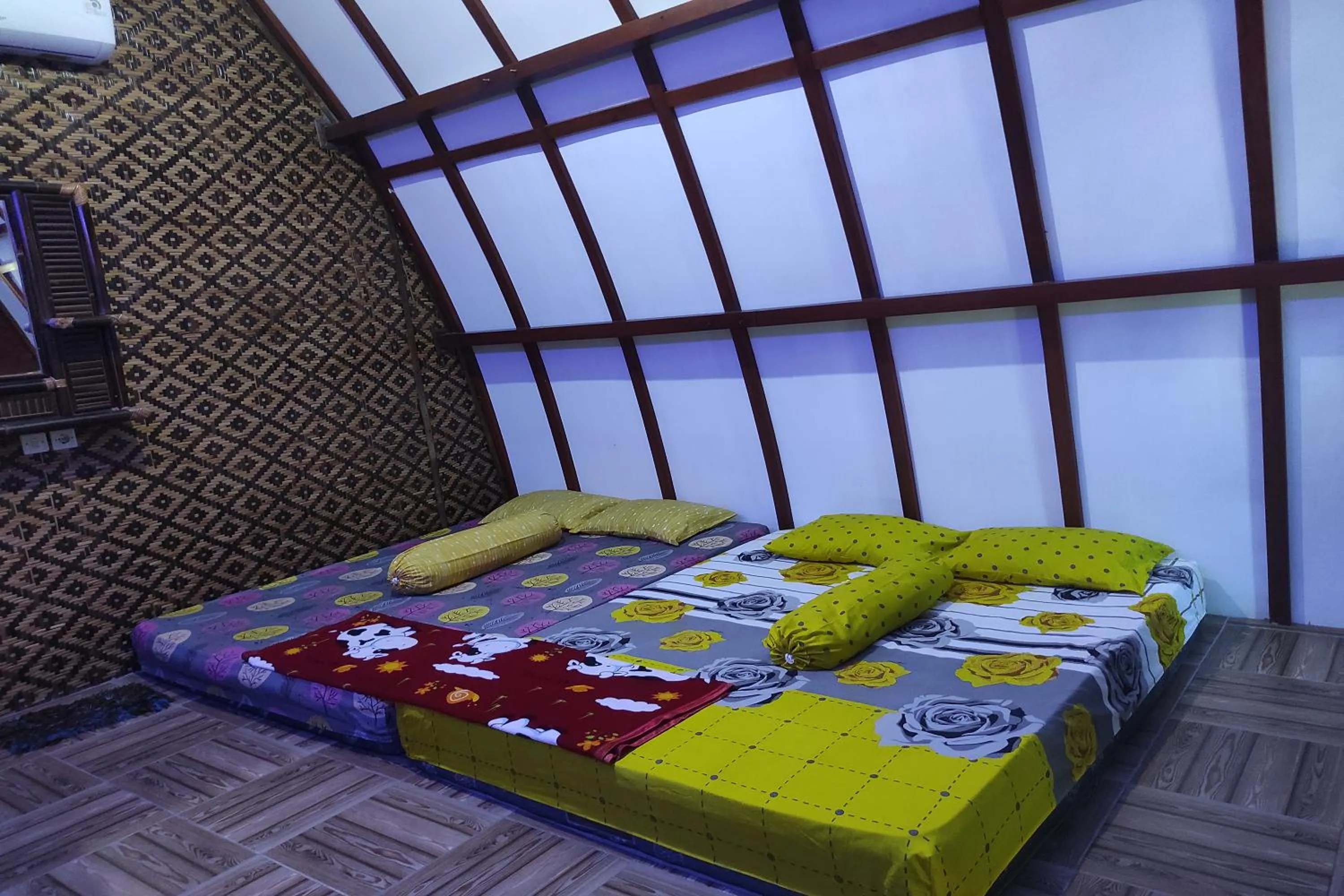 Bed in Penginapan Putra Darma