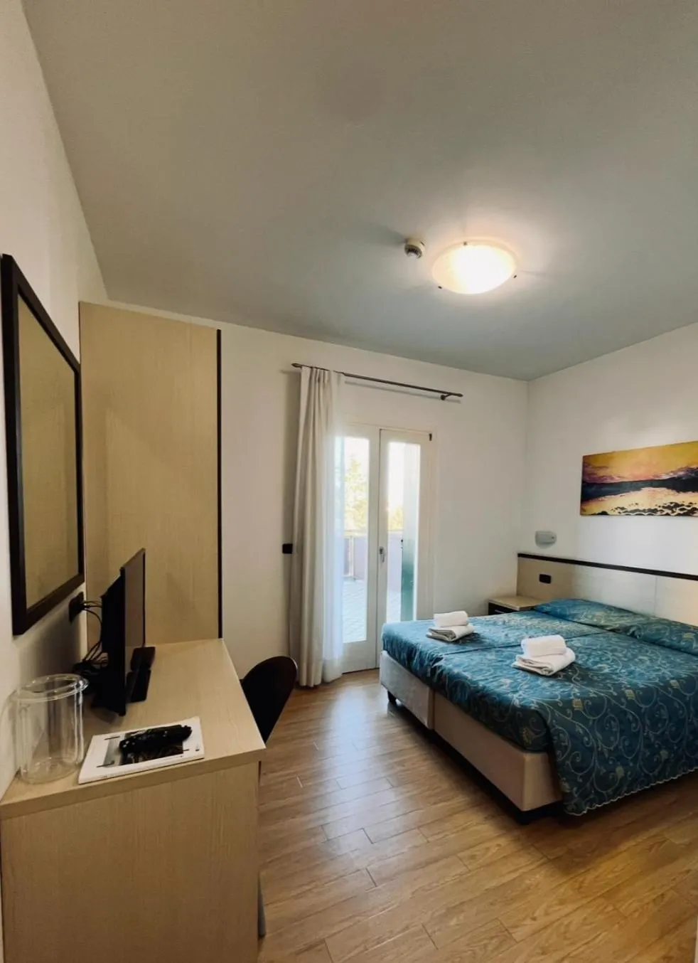 Balcony/Terrace, Bed in Hotel Al Fogo