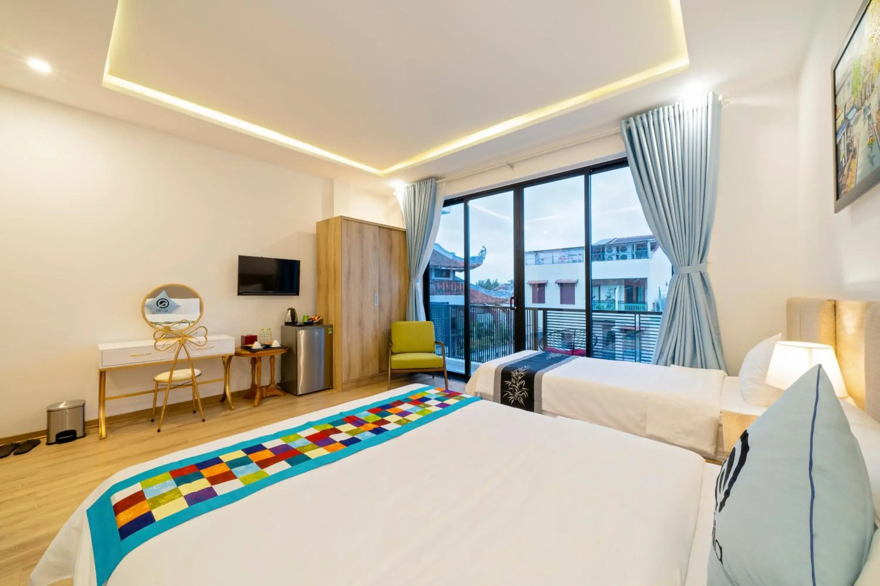 Deluxe Triple Room in Q Villa Hoi An Deluxe Triple Room in Q Villa Hoi An