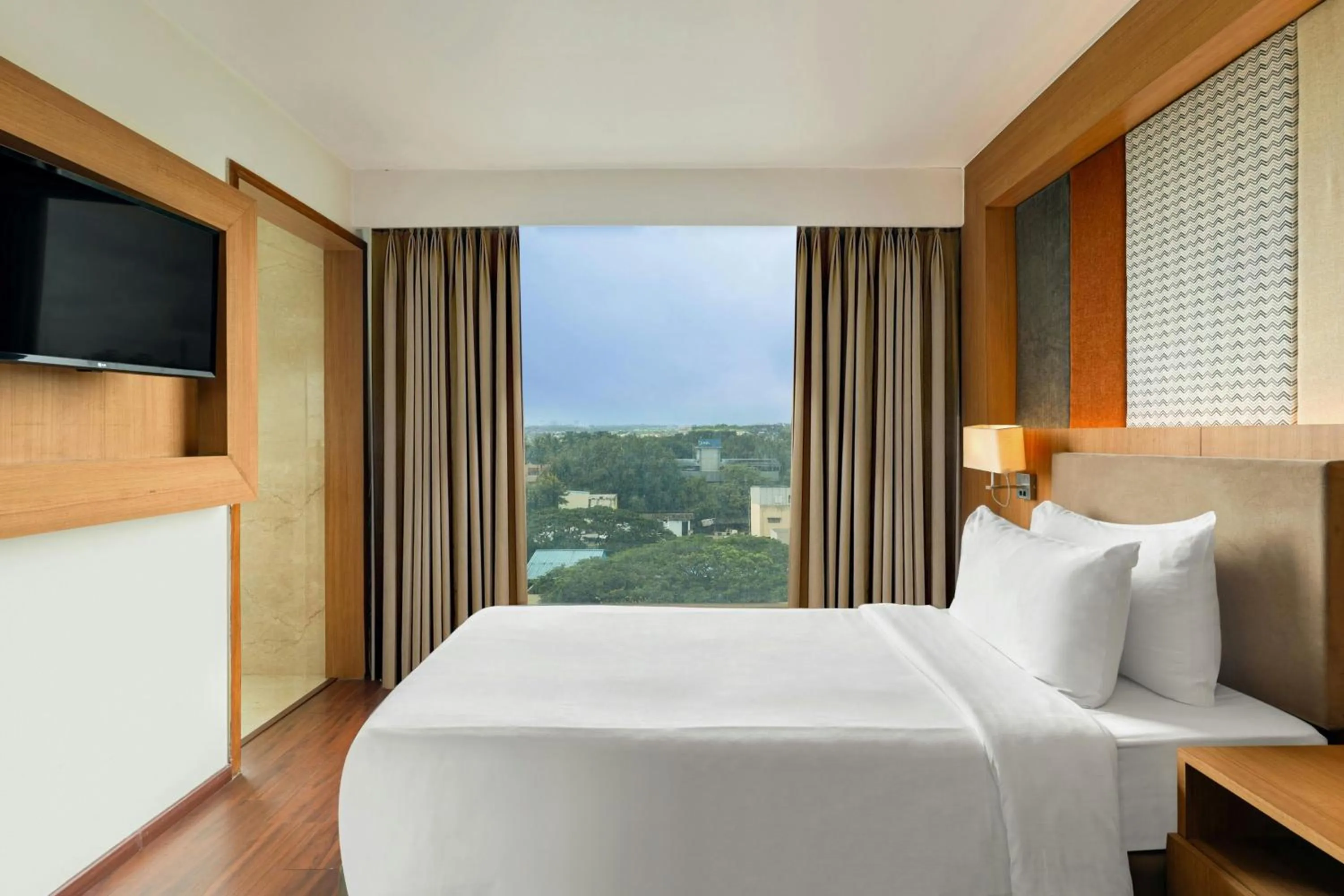 Photo of the whole room, Bed in The Fern, Kolhapur, Series by Marriott