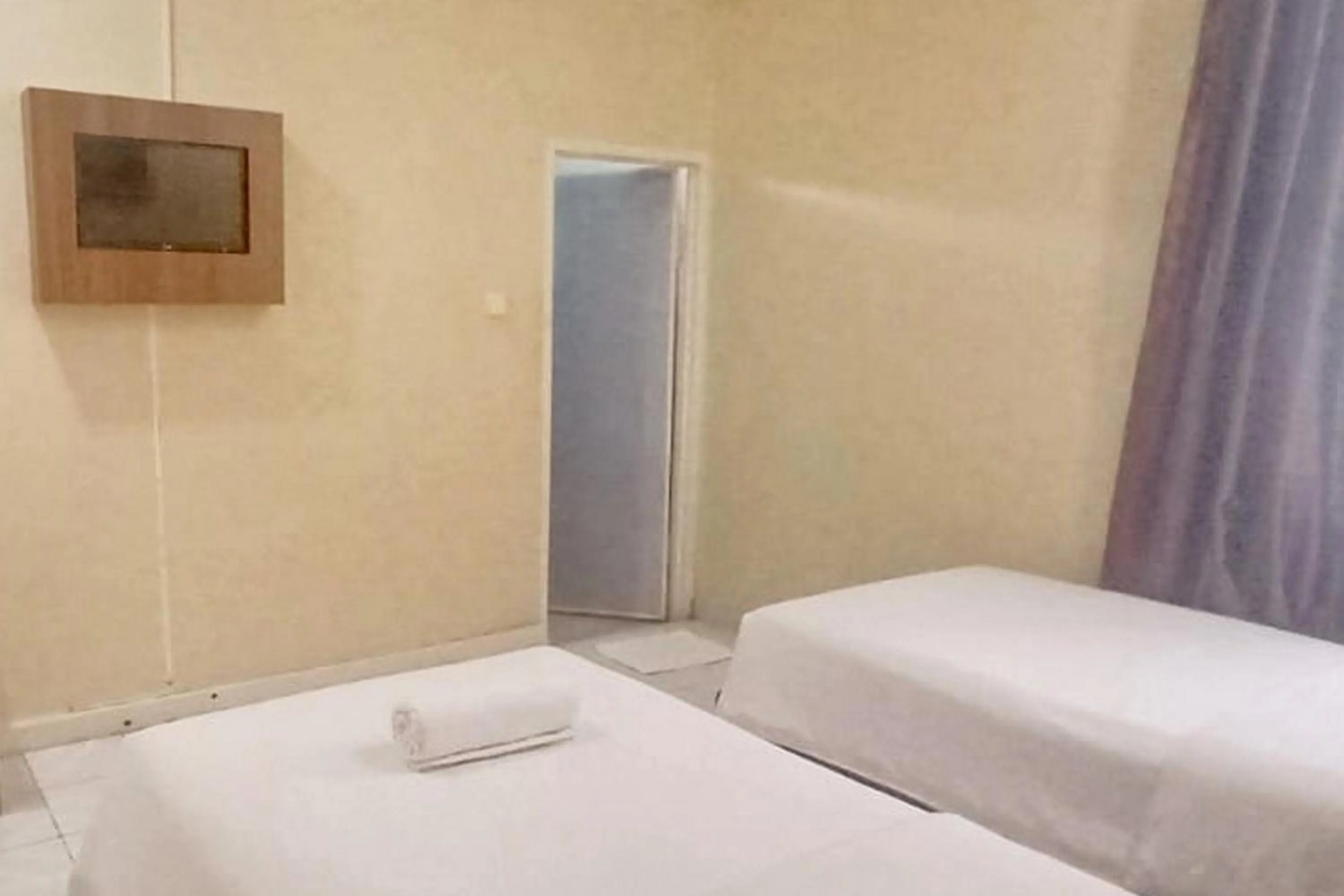 Bedroom in Hotel Shafira Pariaman Syariah Mitra RedDoorz