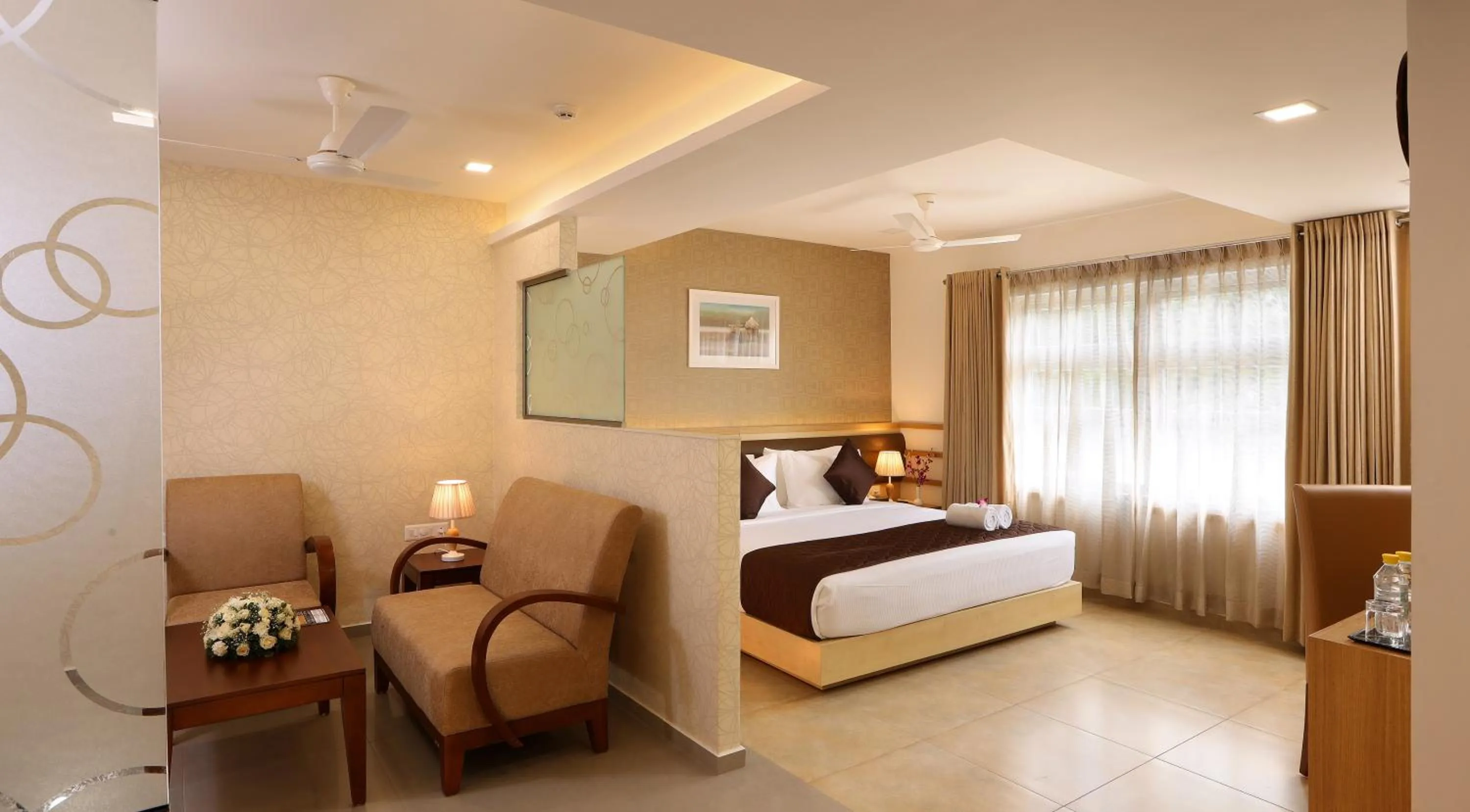 Photo of the whole room, Bed in Flora Charishma Residency Aluva