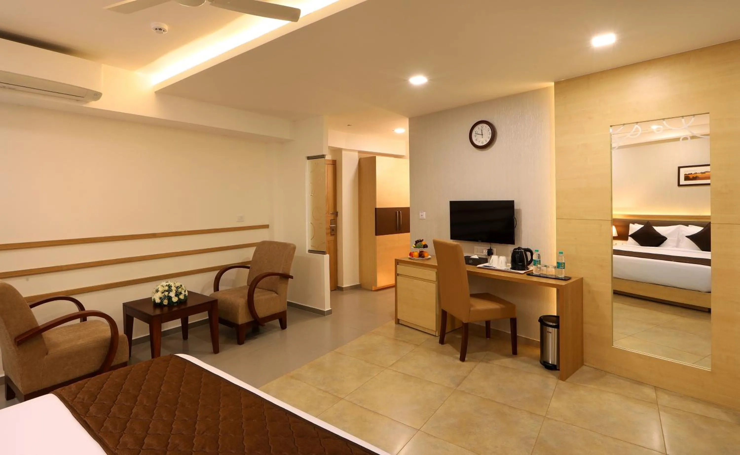 Seating area, Bed in Flora Charishma Residency Aluva