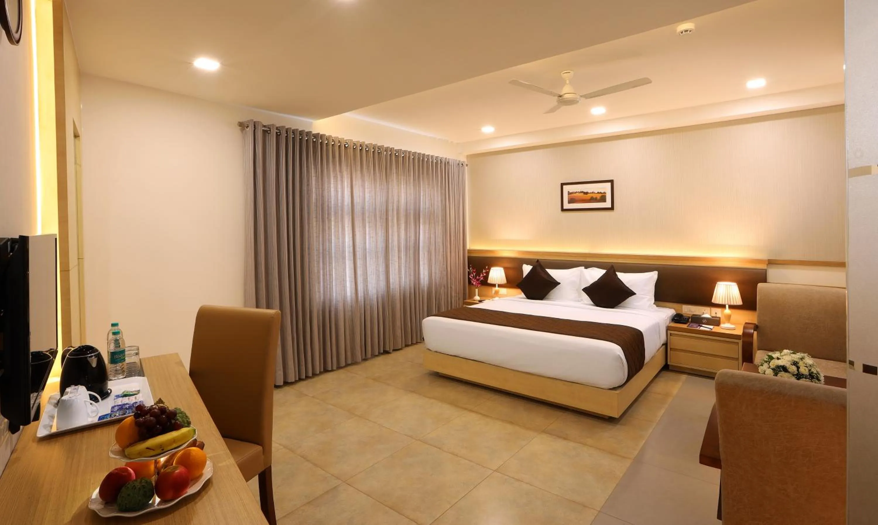 Photo of the whole room, Bed in Flora Charishma Residency Aluva