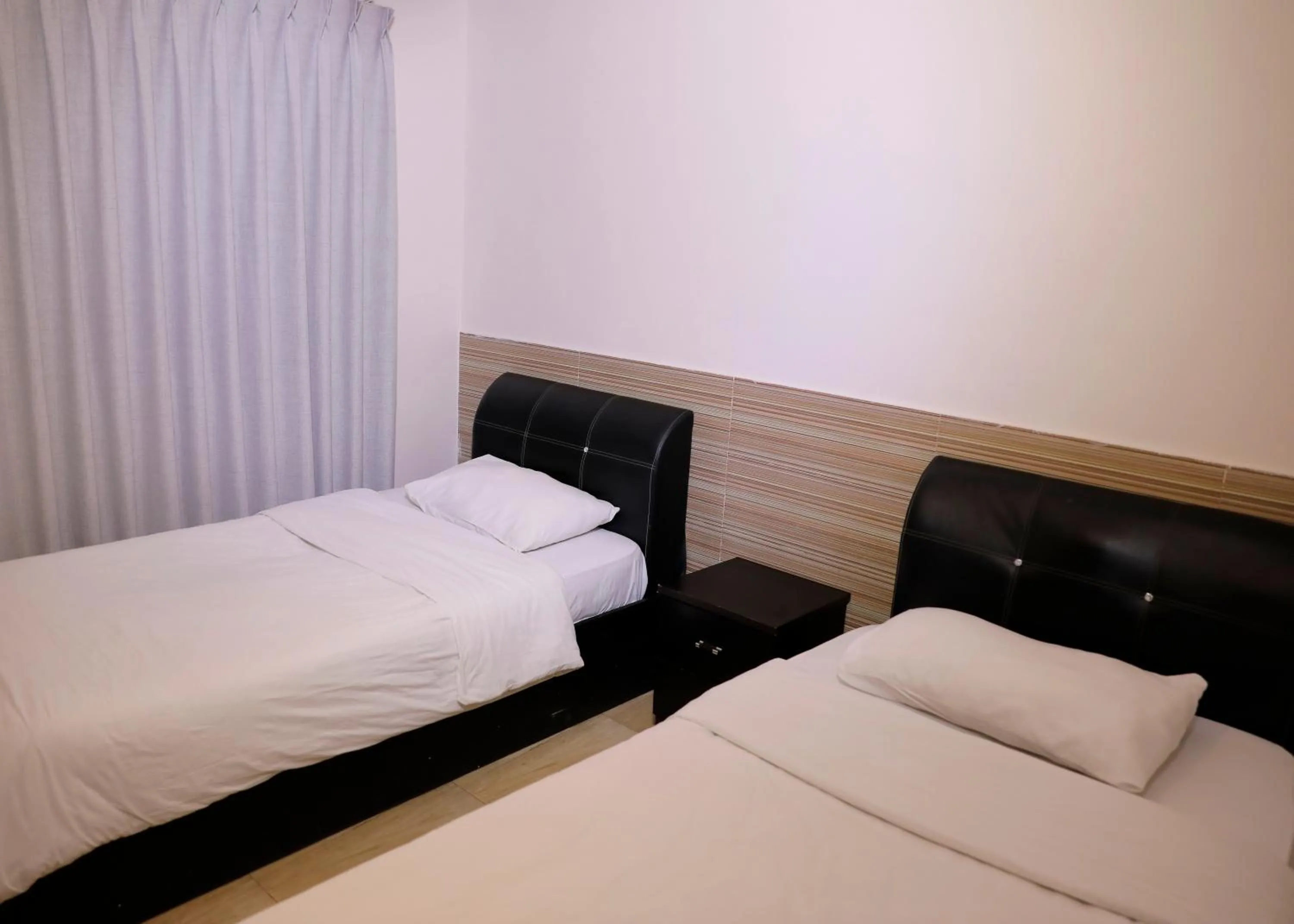 Bed in Abu Alsoud Hotel