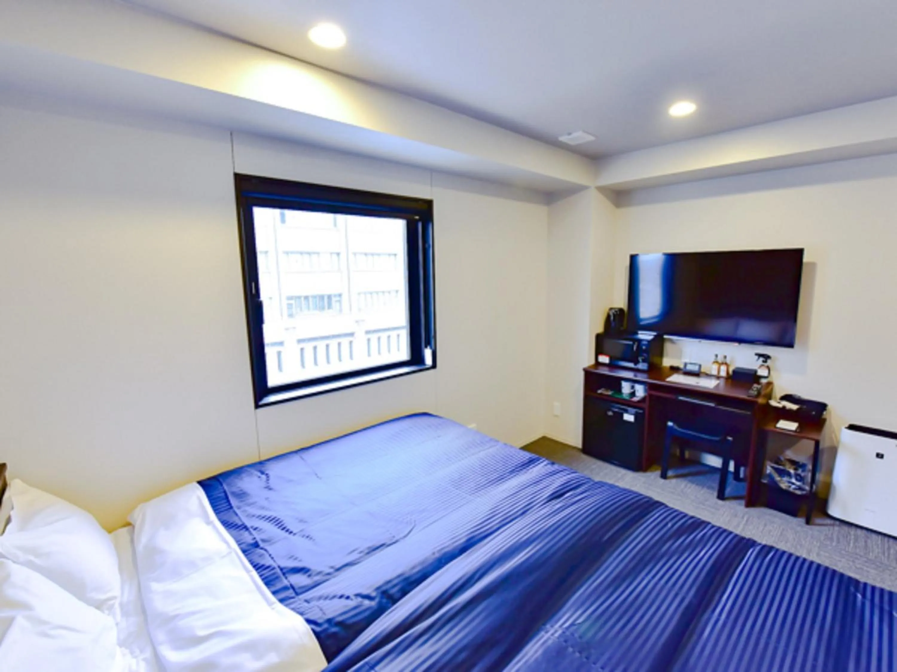 Bed in HOTEL LiVEMAX Okayama West