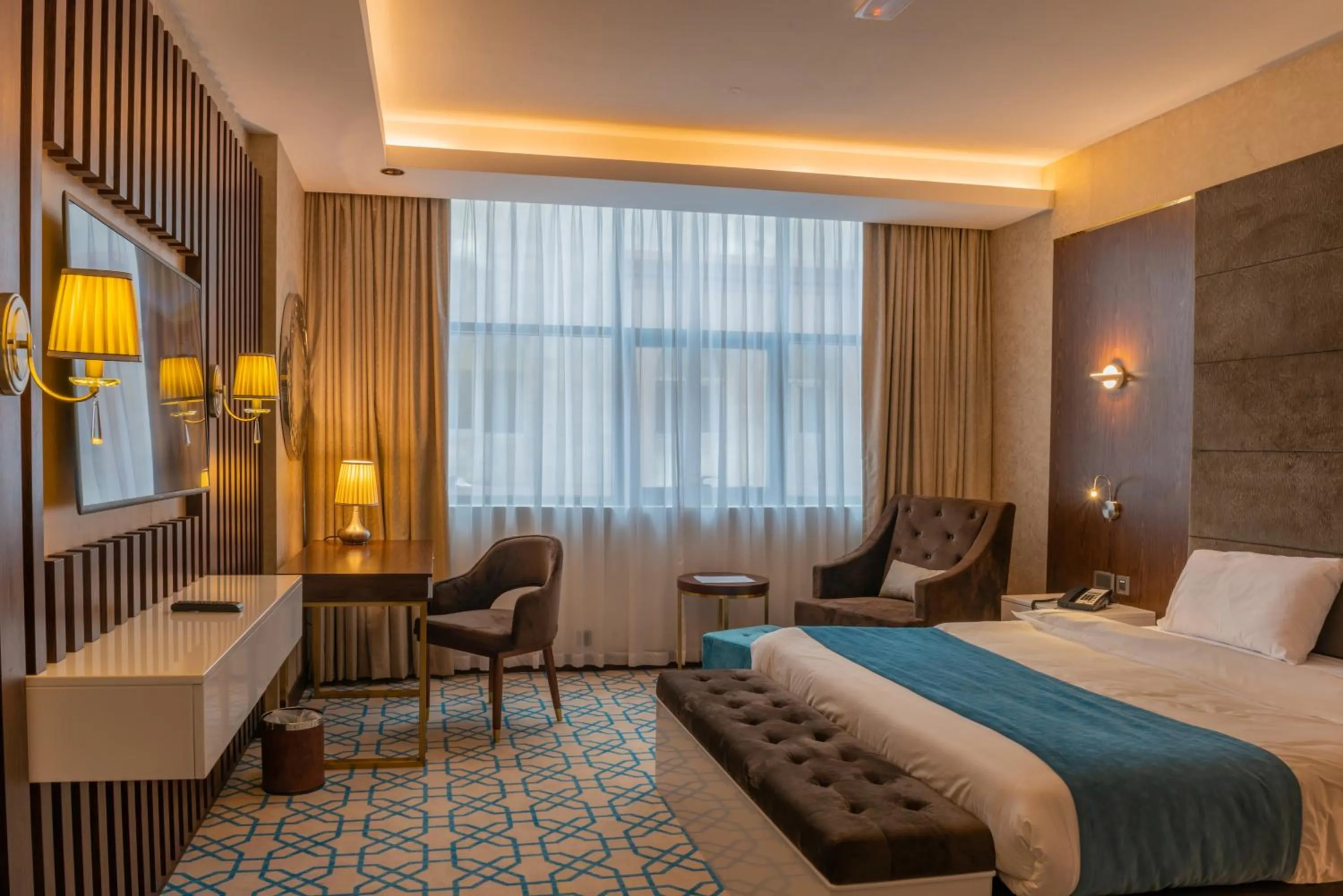 Bed in Royal Crown Hotel