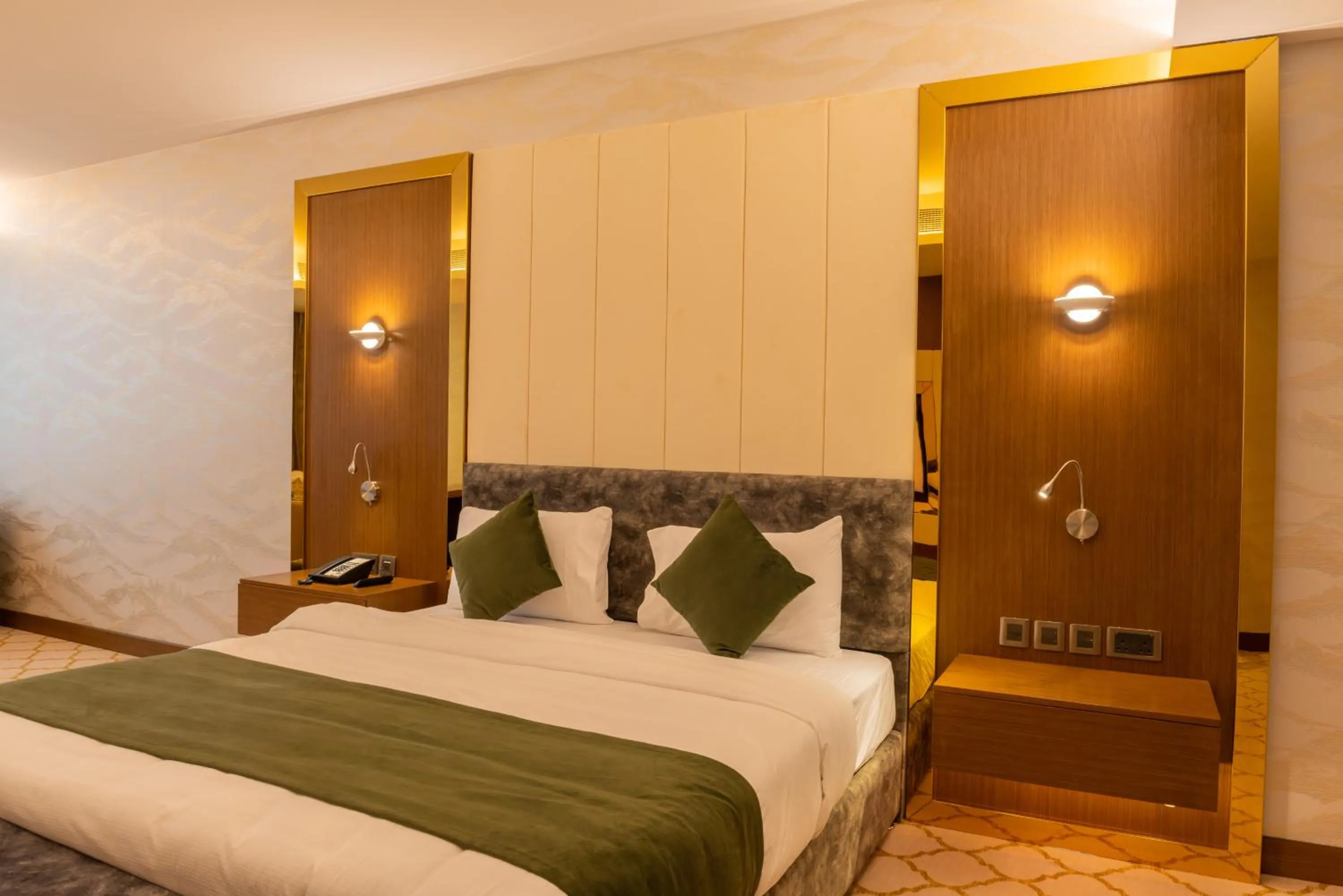 Bed in Royal Crown Hotel