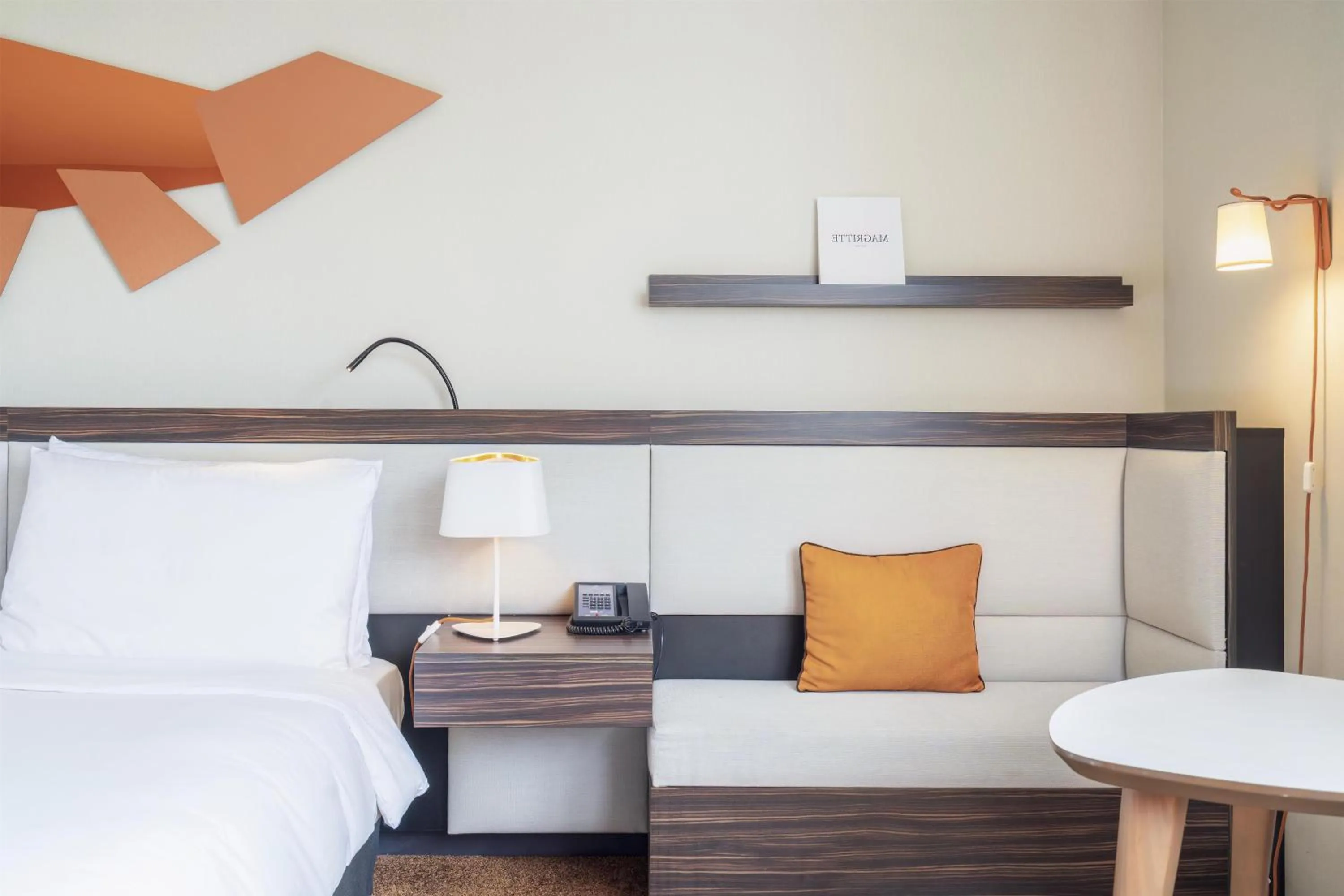 Living room, Bed in DoubleTree by Hilton Paris Boulogne