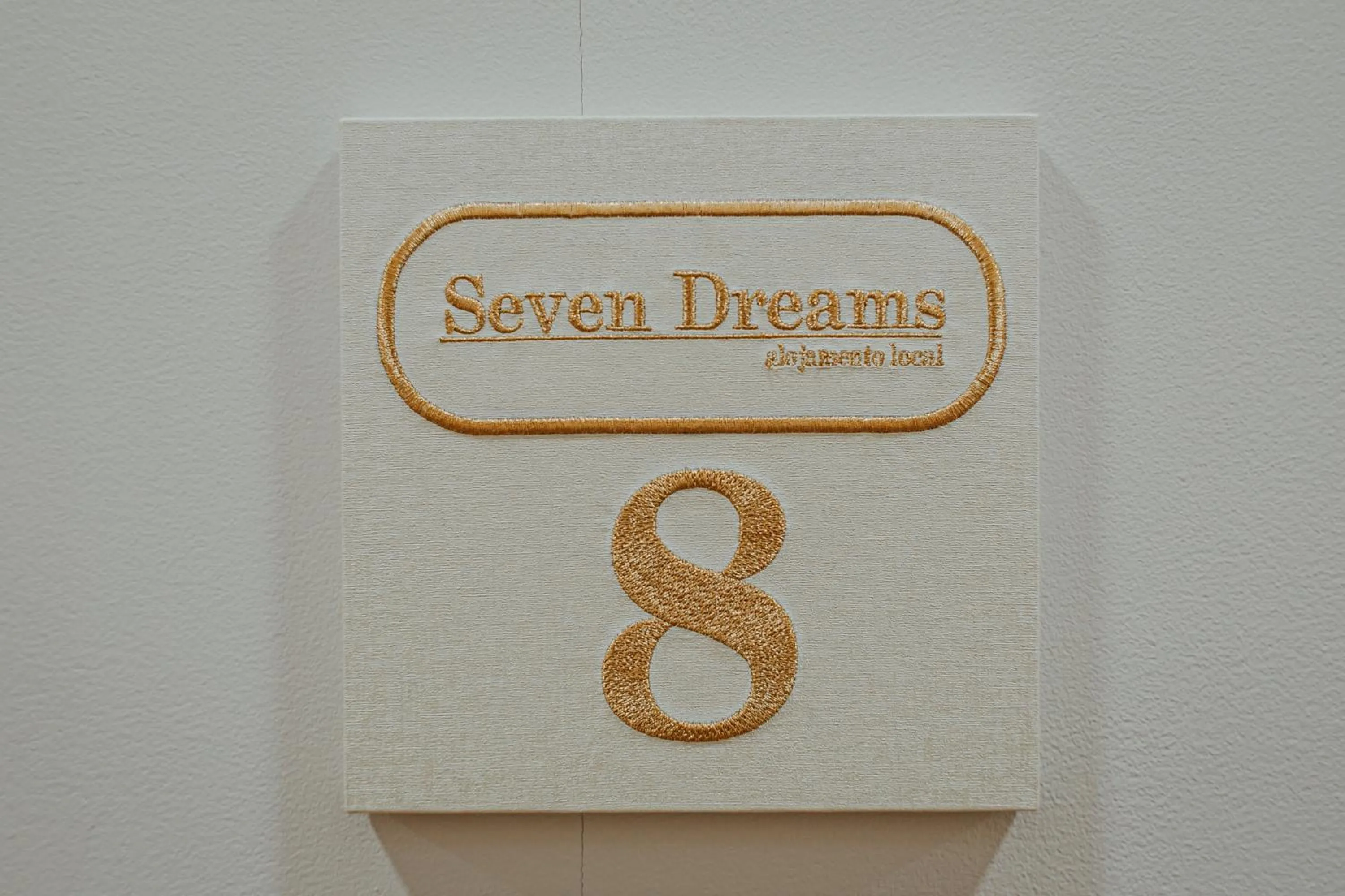 Property logo or sign in Seven Dreams Suites