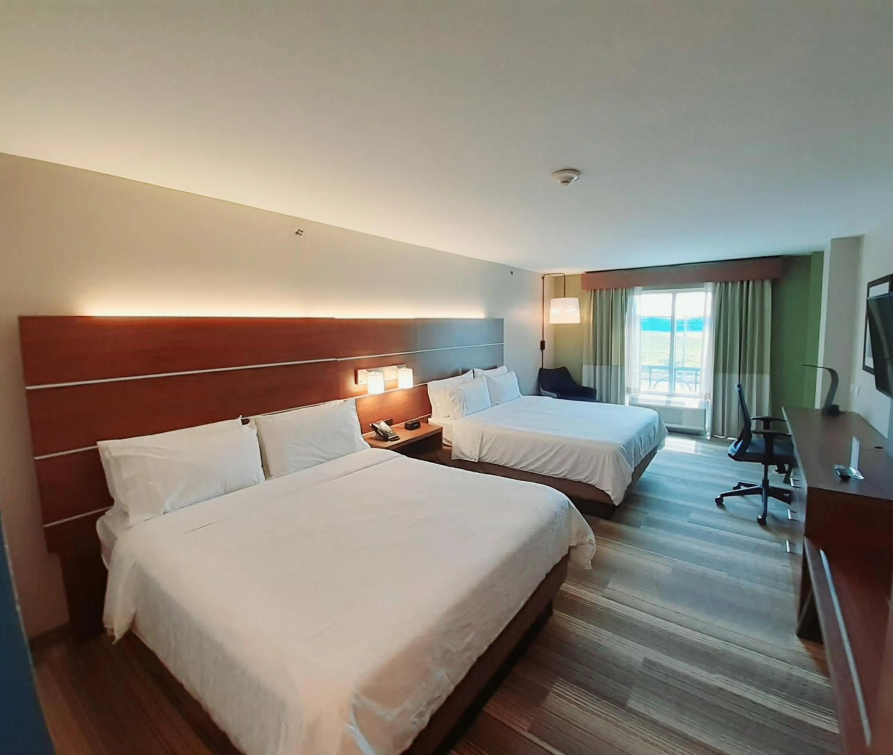 Photo of the whole room, Bed in Holiday Inn Express Trincity by IHG