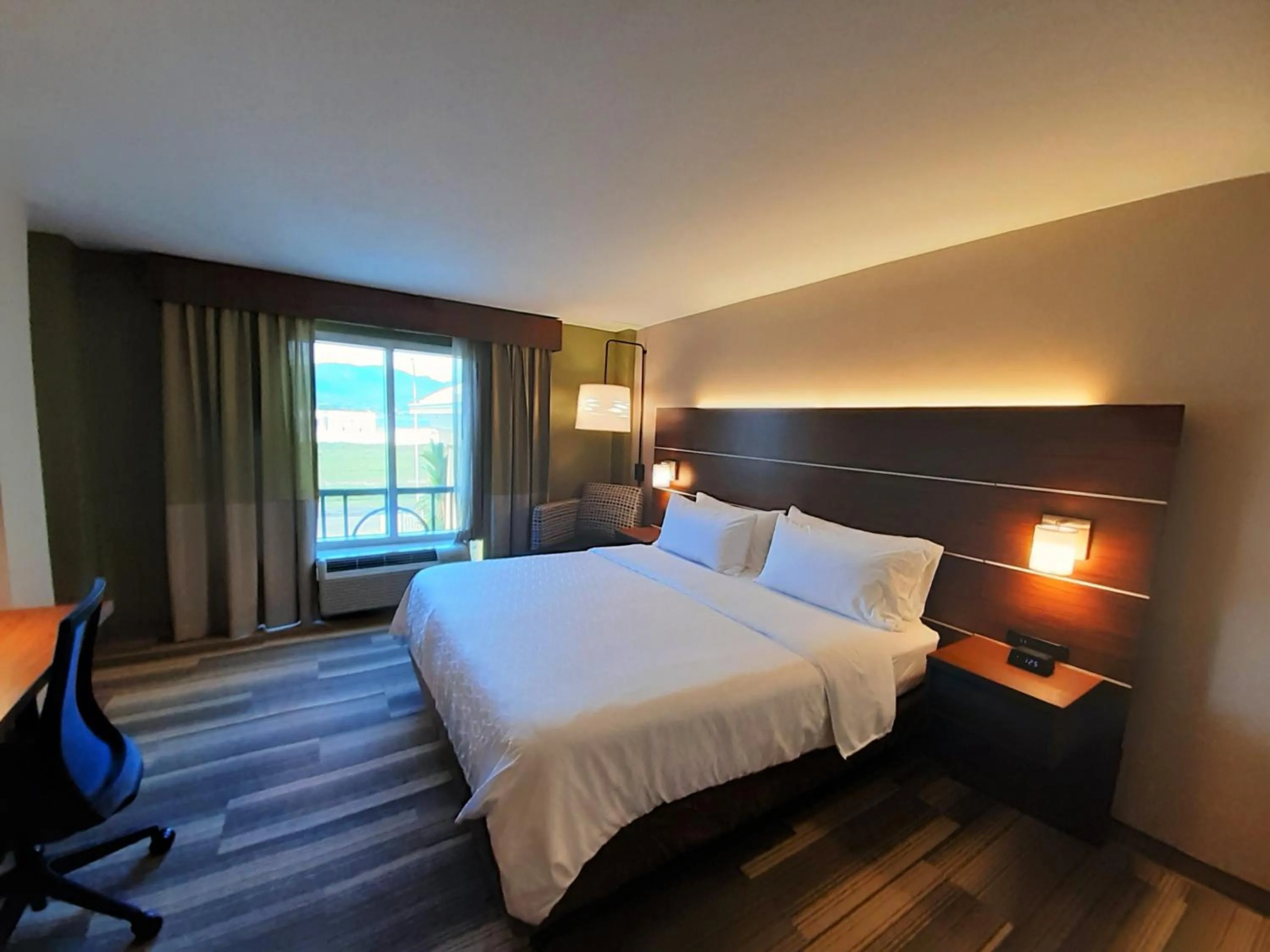 Photo of the whole room, Bed in Holiday Inn Express Trincity by IHG