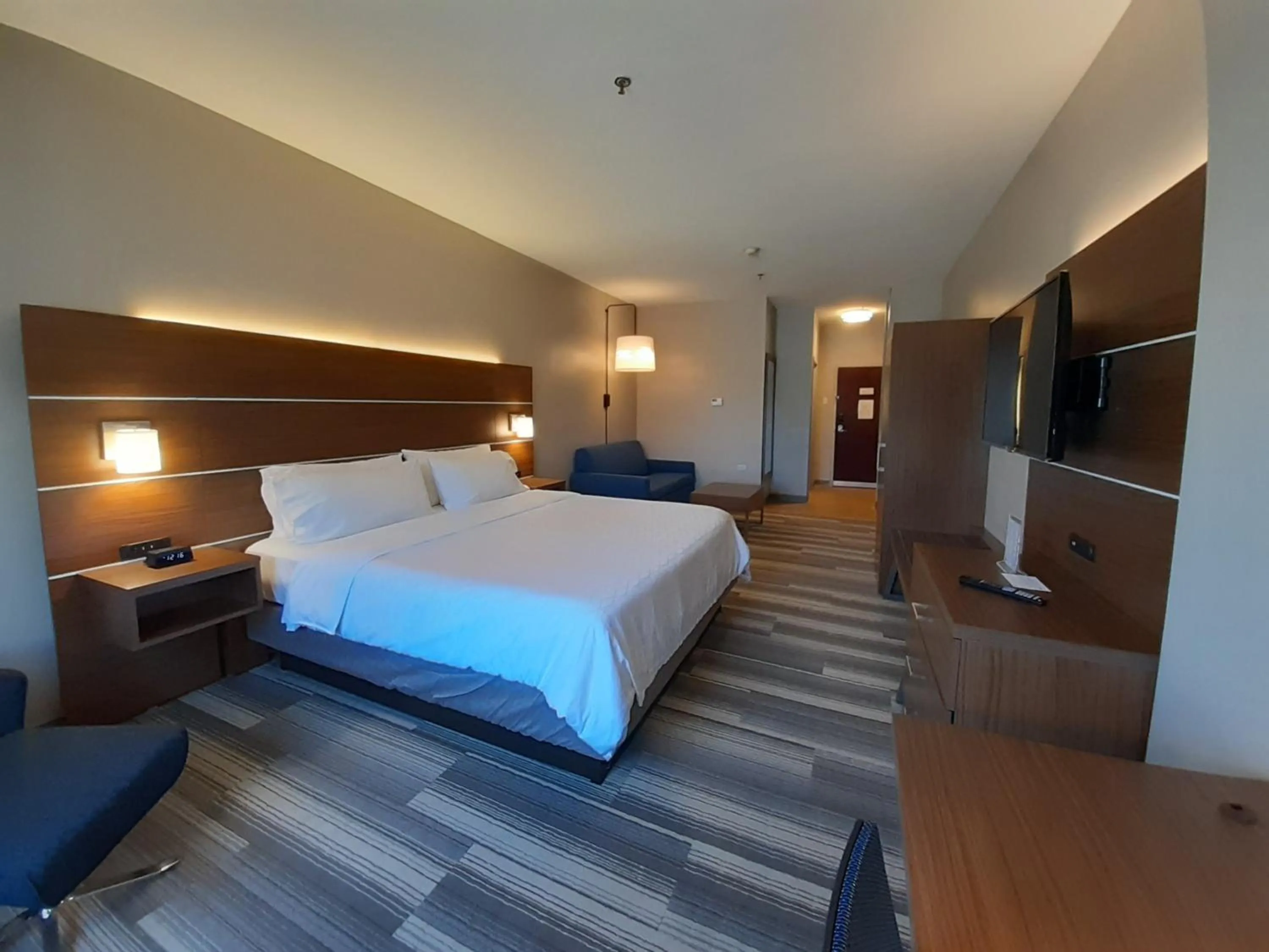 Photo of the whole room, Bed in Holiday Inn Express Trincity by IHG