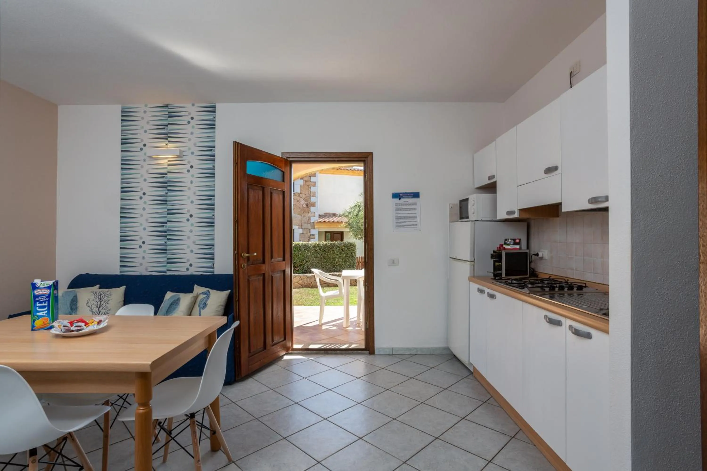 Kitchen or kitchenette in Appartamenti Tanaunella