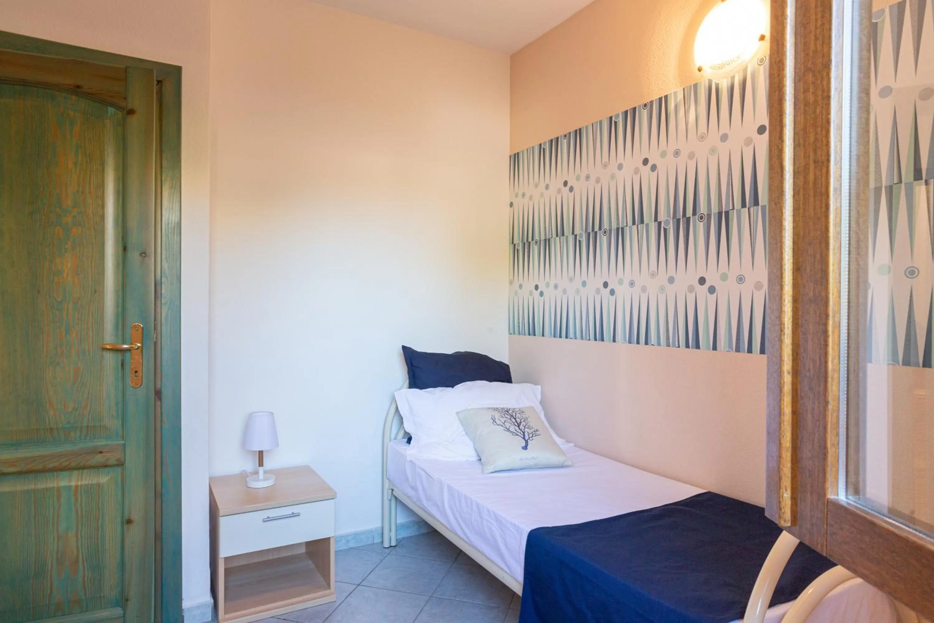 Bedroom in Appartamenti Tanaunella