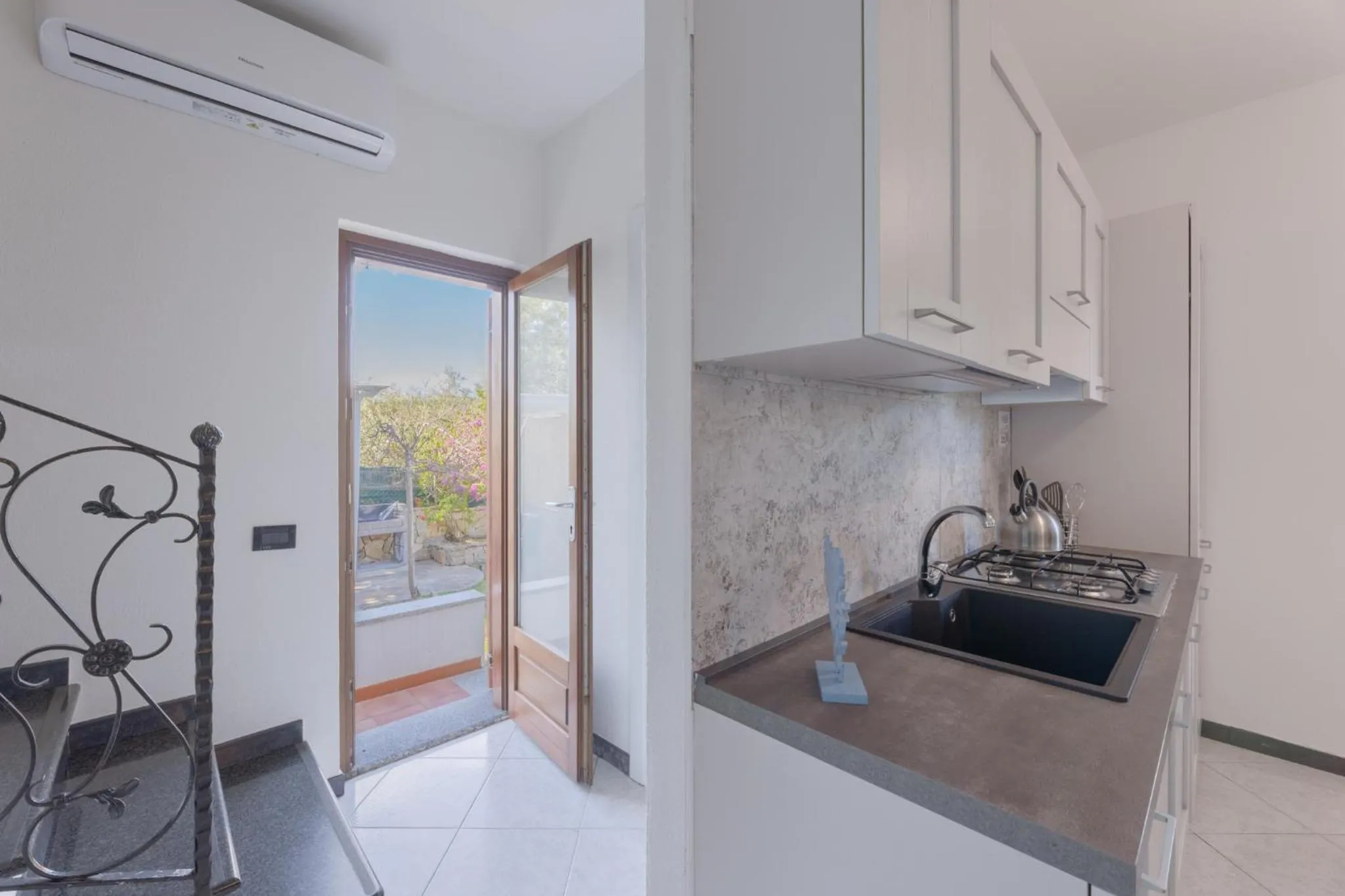 Kitchen or kitchenette in Appartamenti Le Magnolie