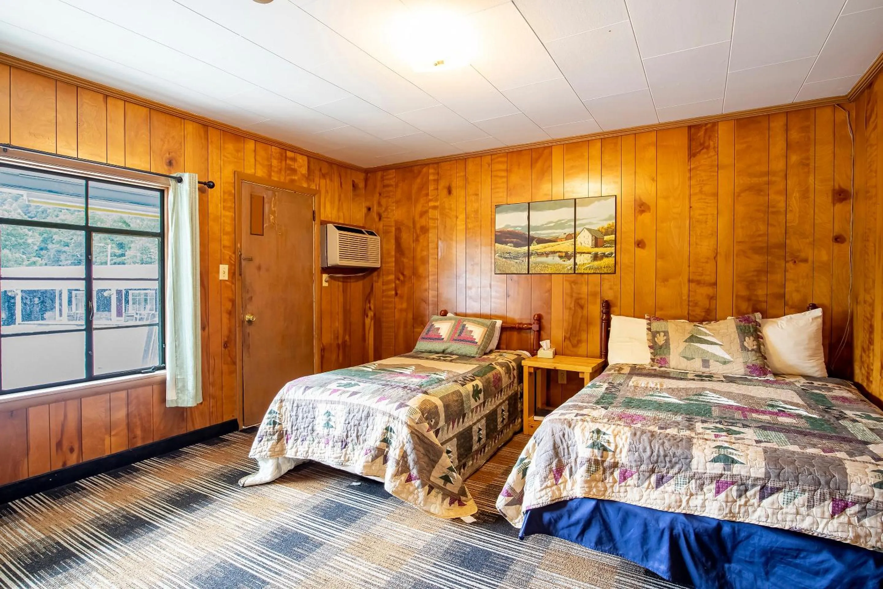 Bedroom, Bed in Lloyd's On The River Country Inn By Oyo