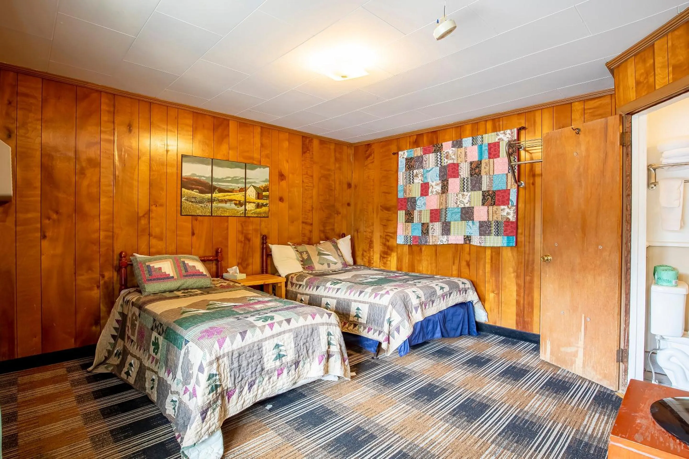 Bedroom, Bed in Lloyd's On The River Country Inn By Oyo