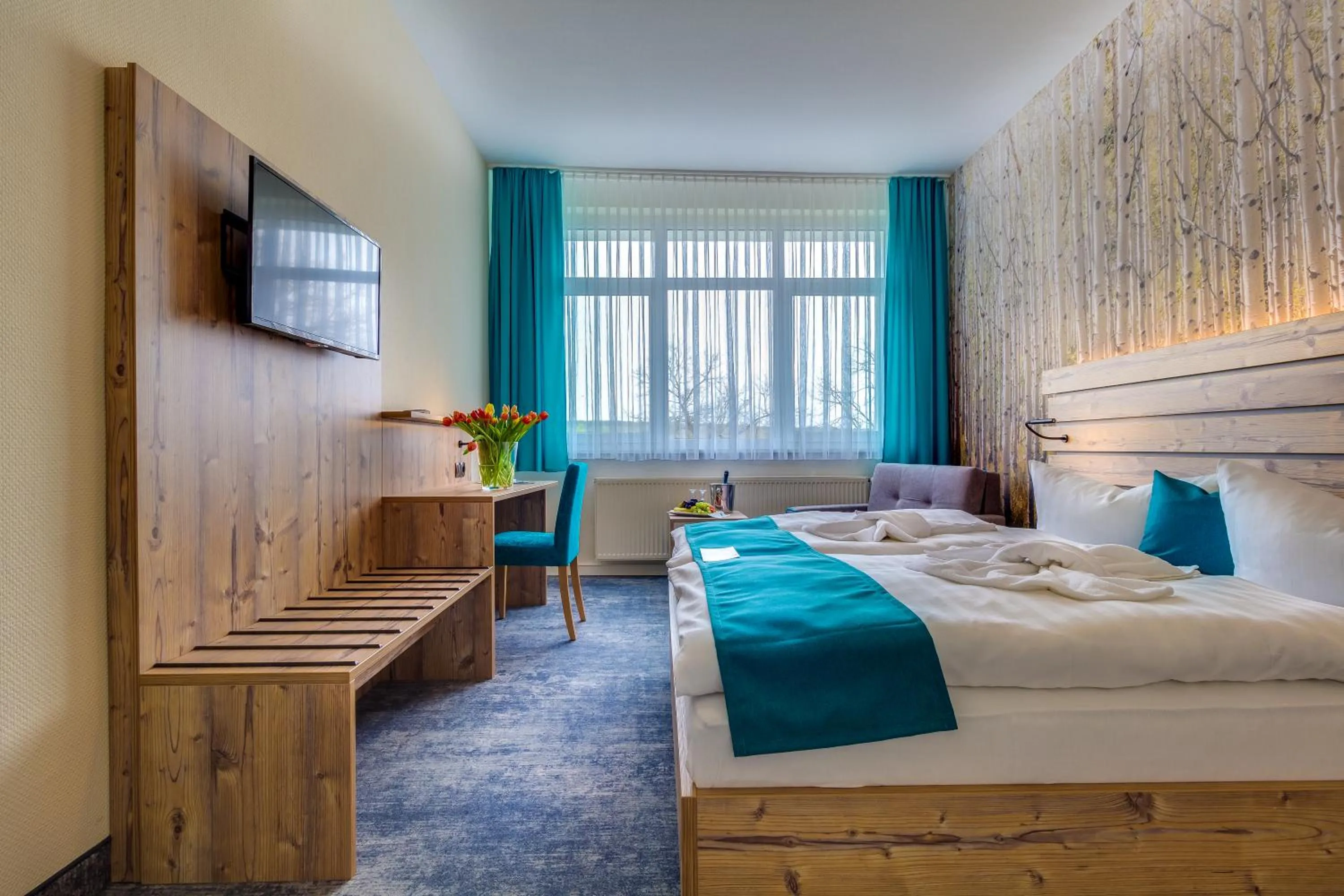 Photo of the whole room, Bed in Panorama Ferien Hotel Harz