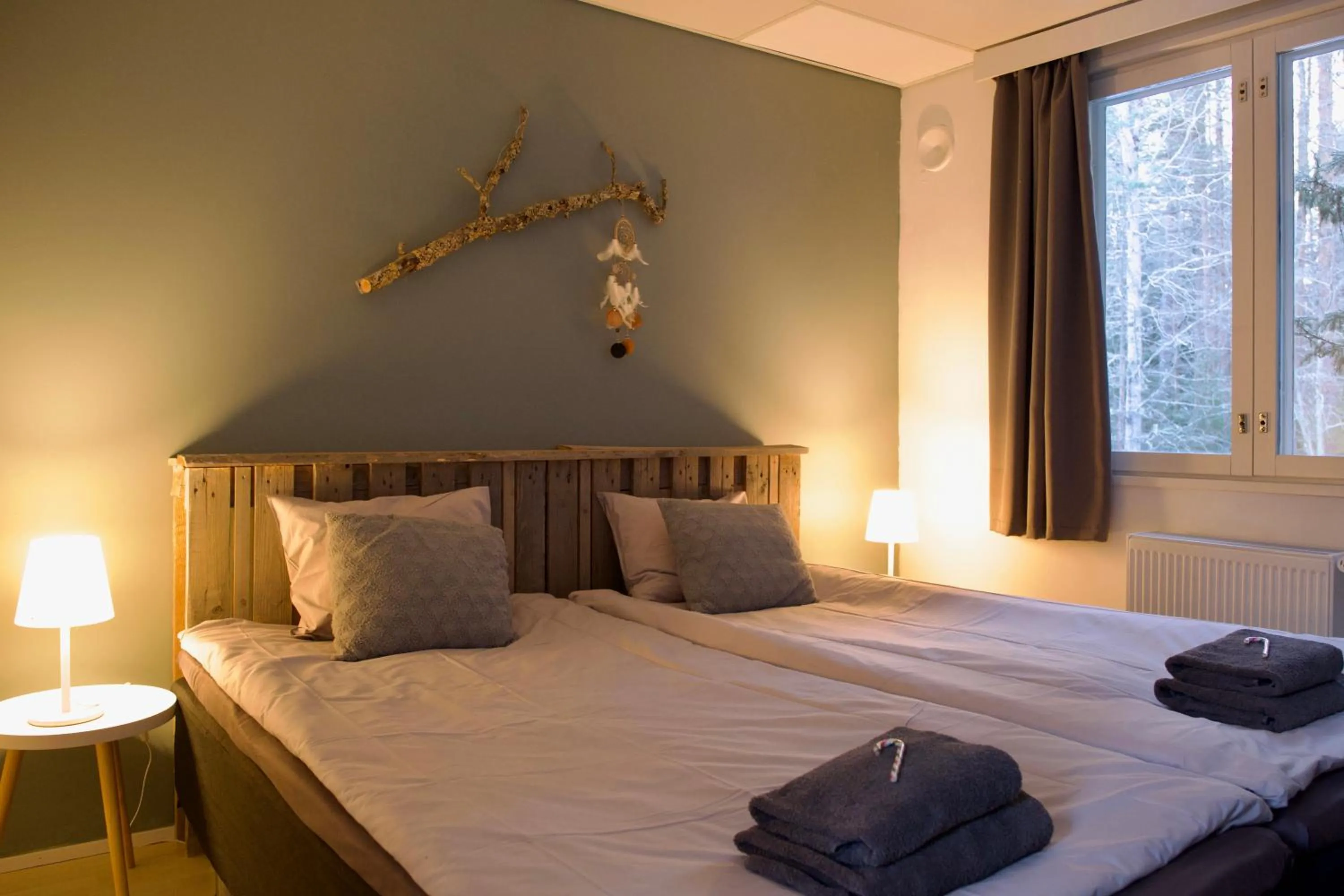 Bed in Taigaschool Eco Hotel