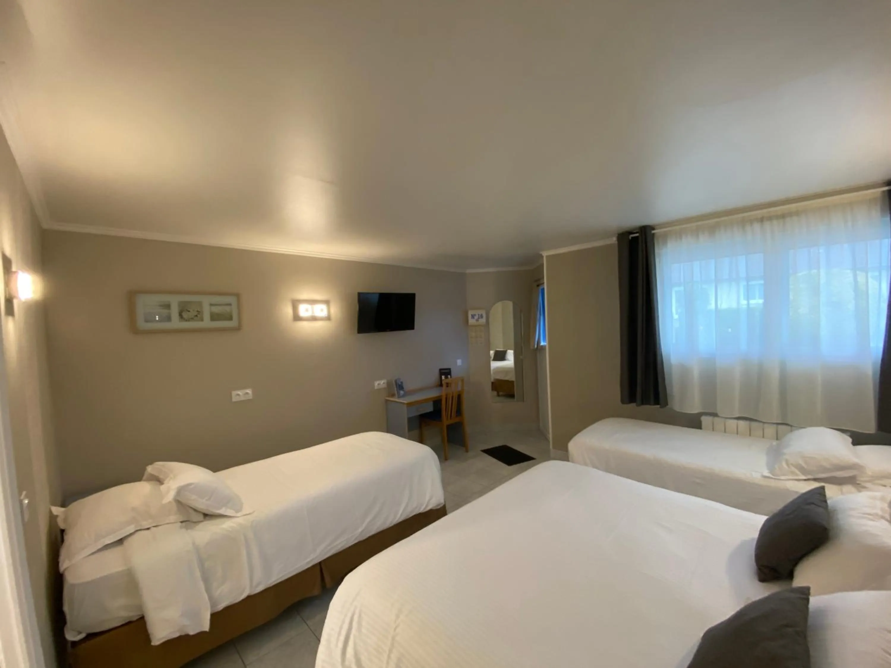 Seating area, Bed in Contact hôtel - Hôtel Les Bleuets & SPA