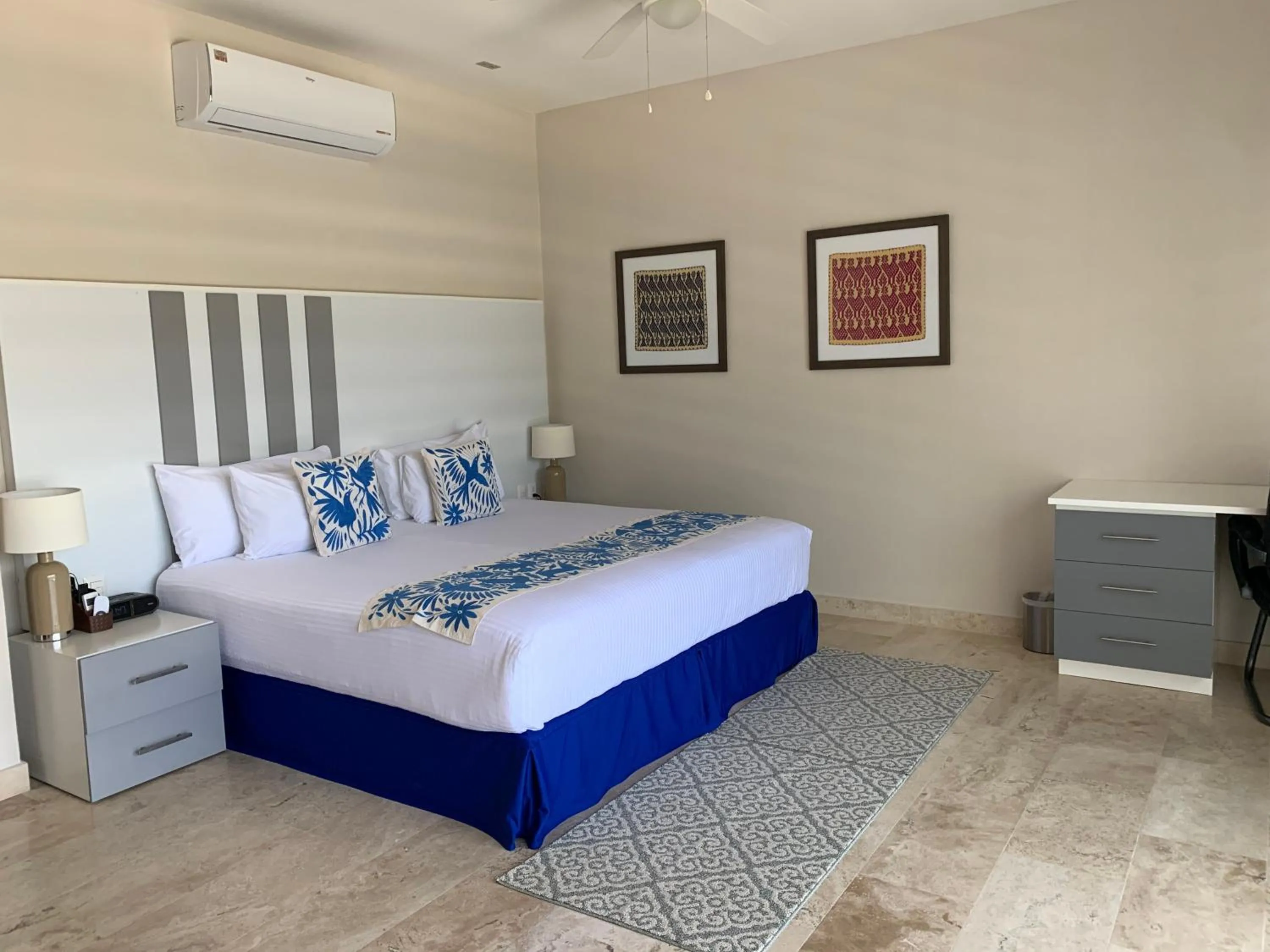 Bed in Xaha Villas Suites & Golf Resort