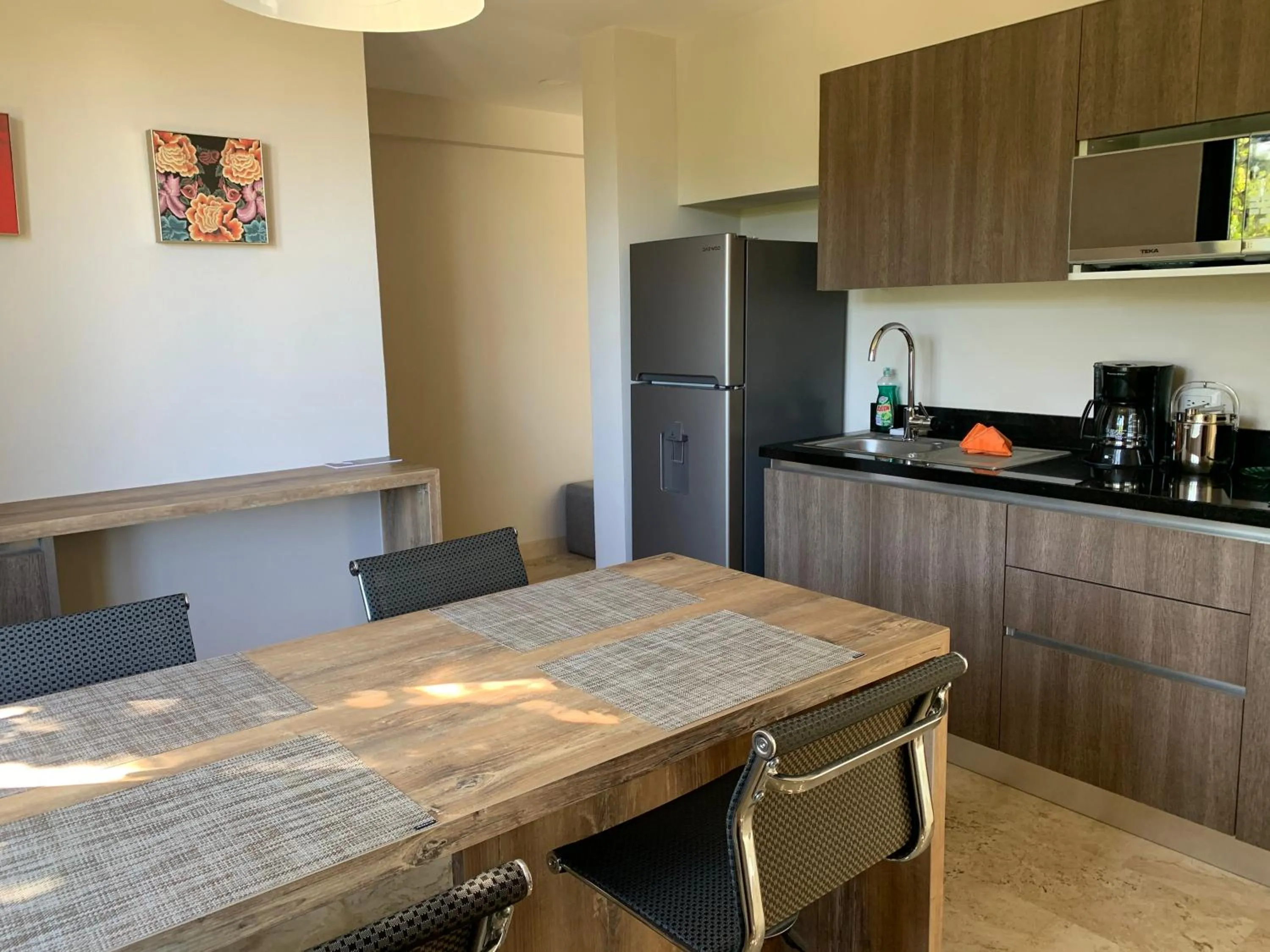 Kitchen or kitchenette in Xaha Villas Suites & Golf Resort