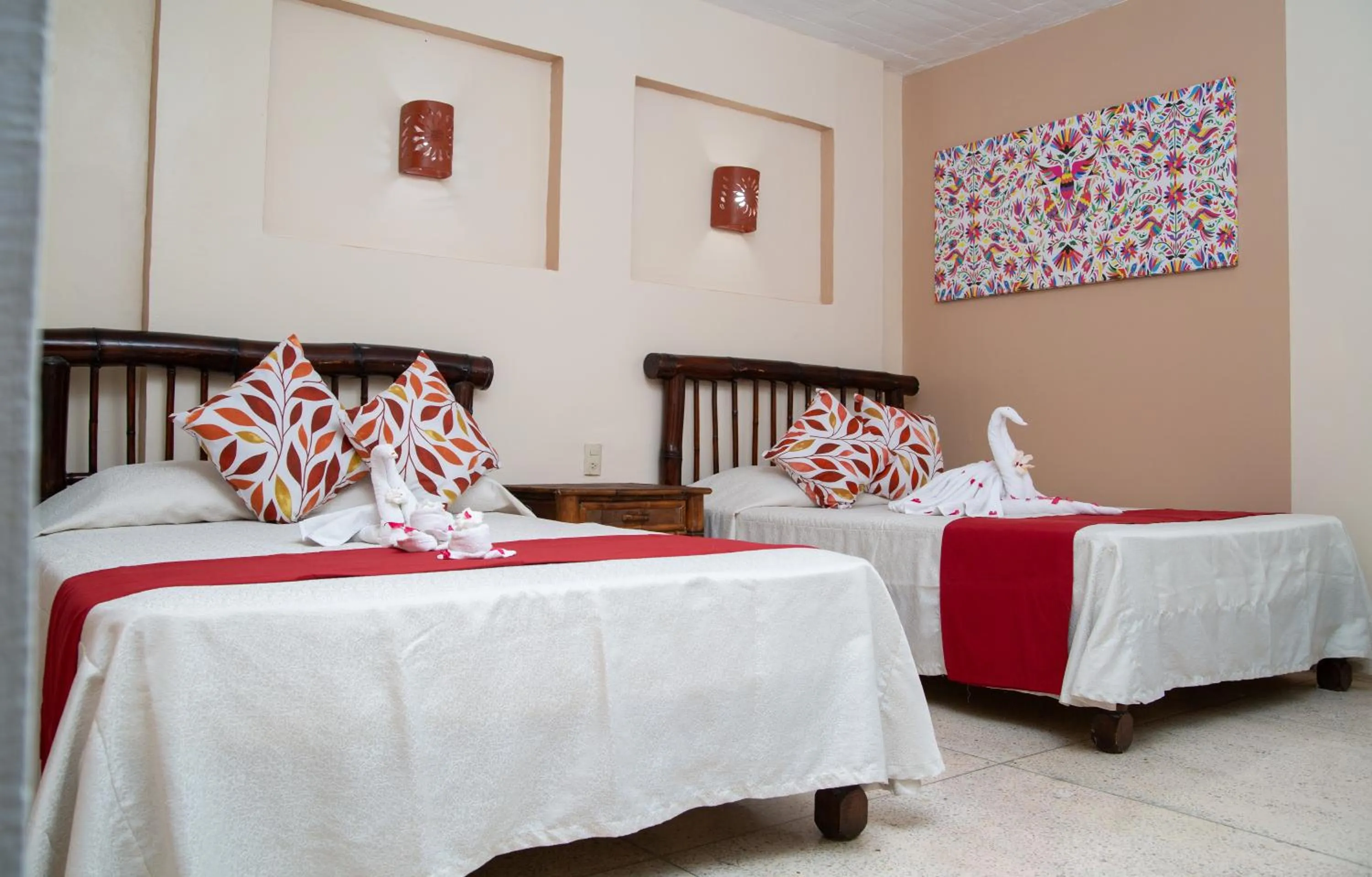 Bed in Hotel Zihua Caracol