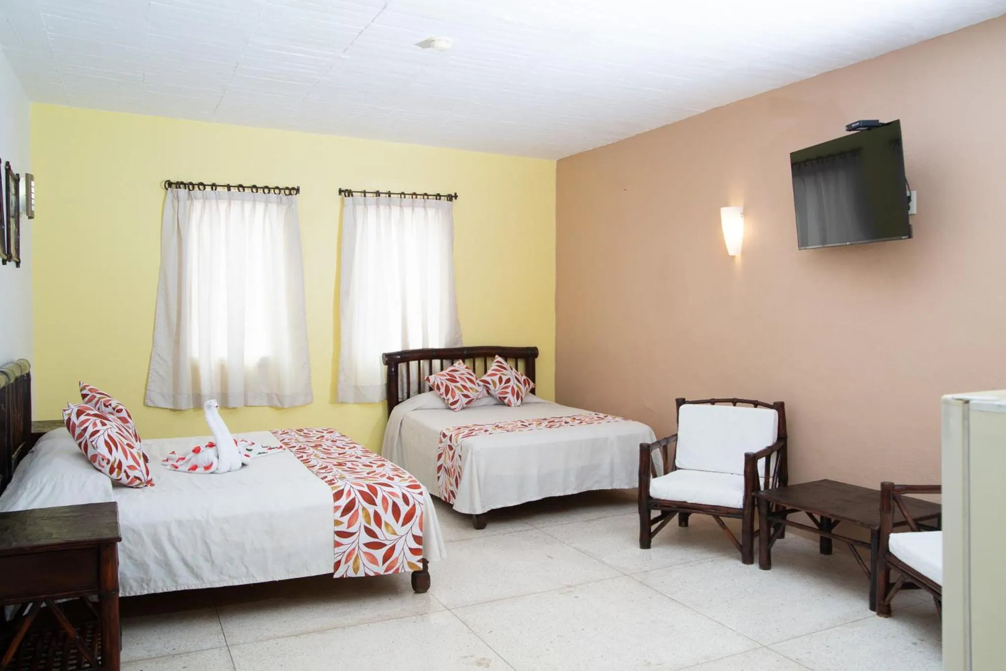 Bed in Hotel Zihua Caracol