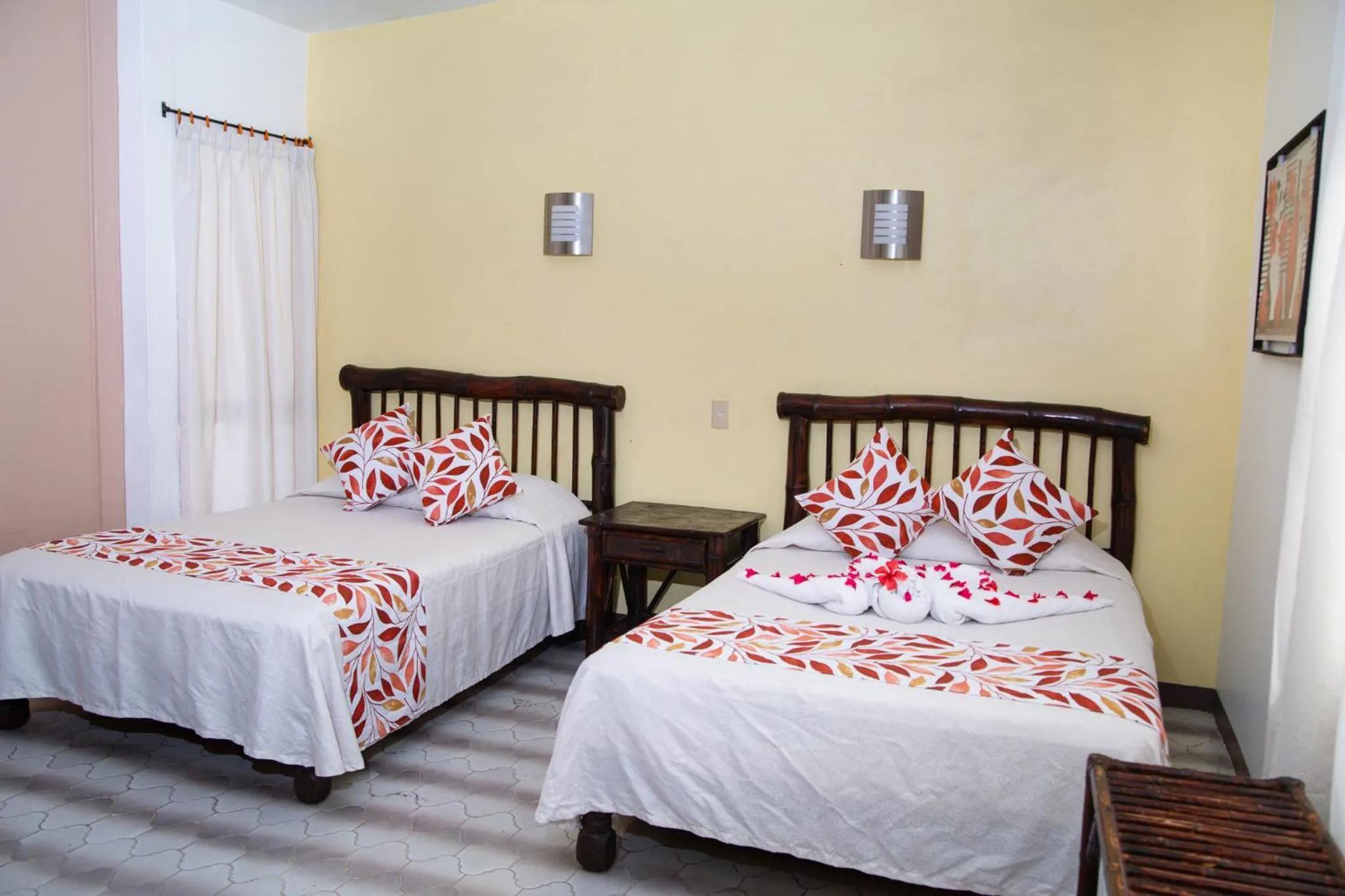 Bed in Hotel Zihua Caracol