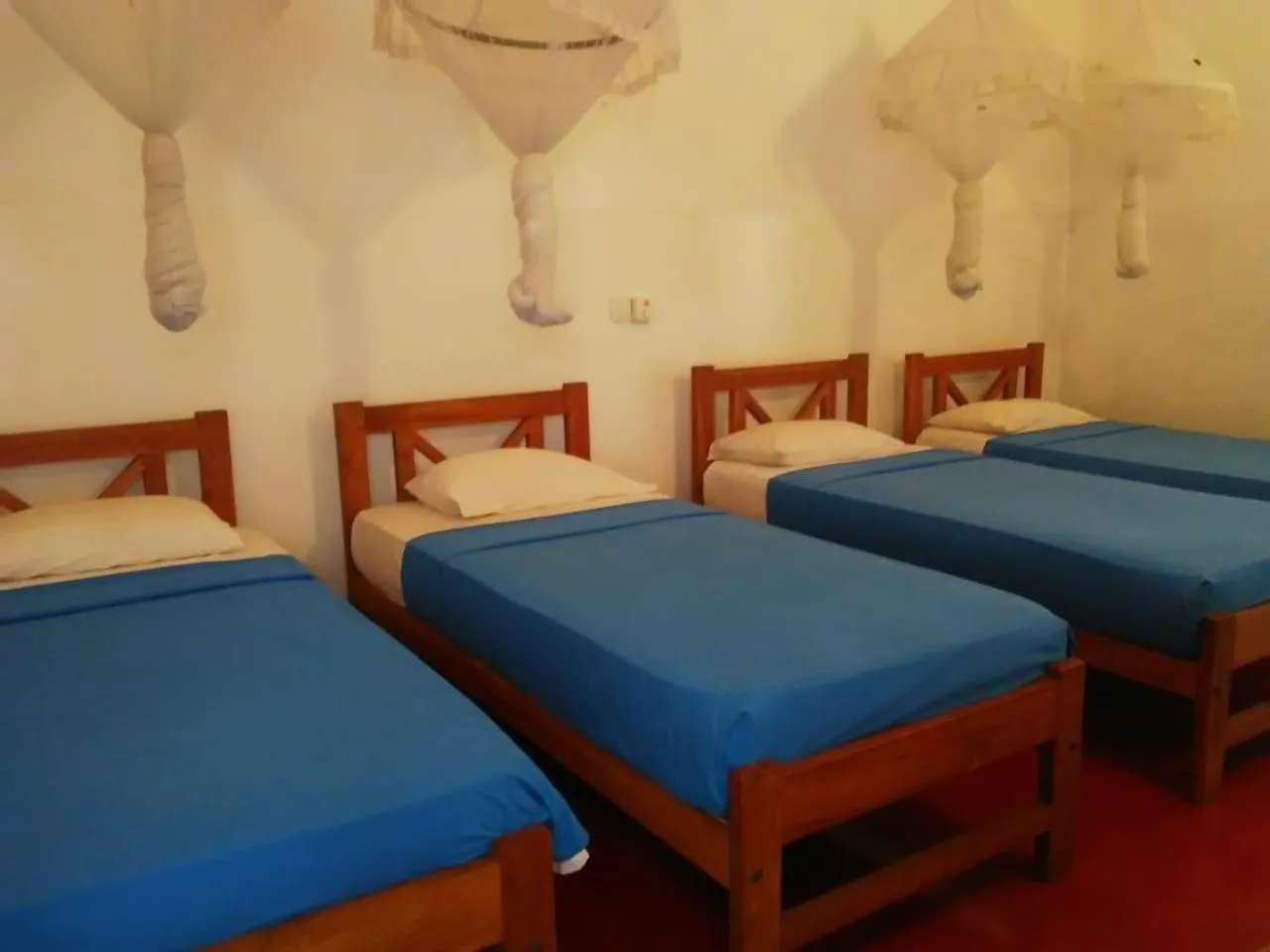 Bed in Hotel Mango Garden