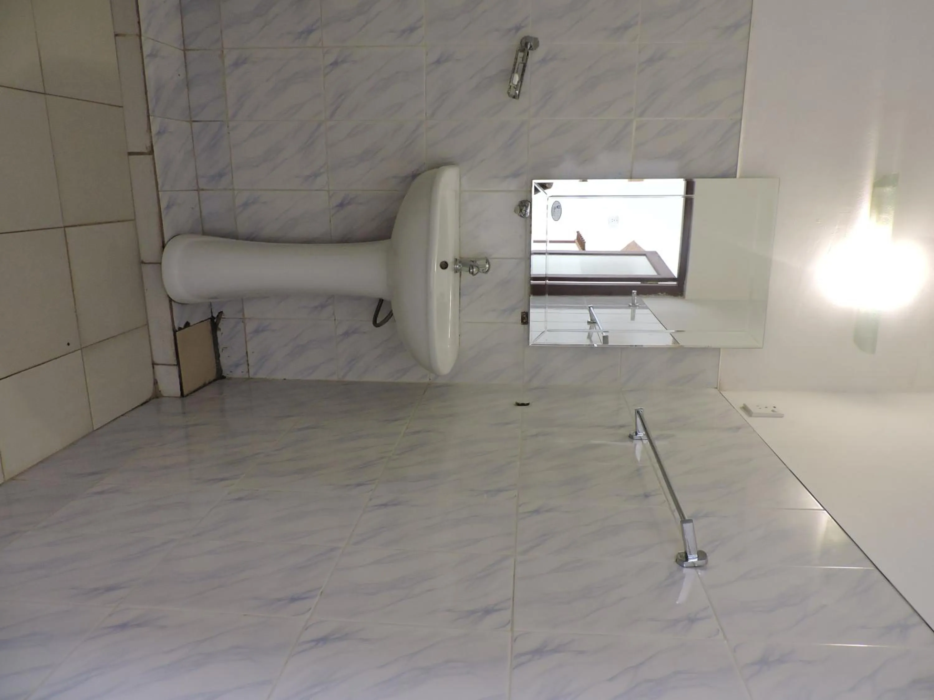 Bathroom in Hotel Mango Garden