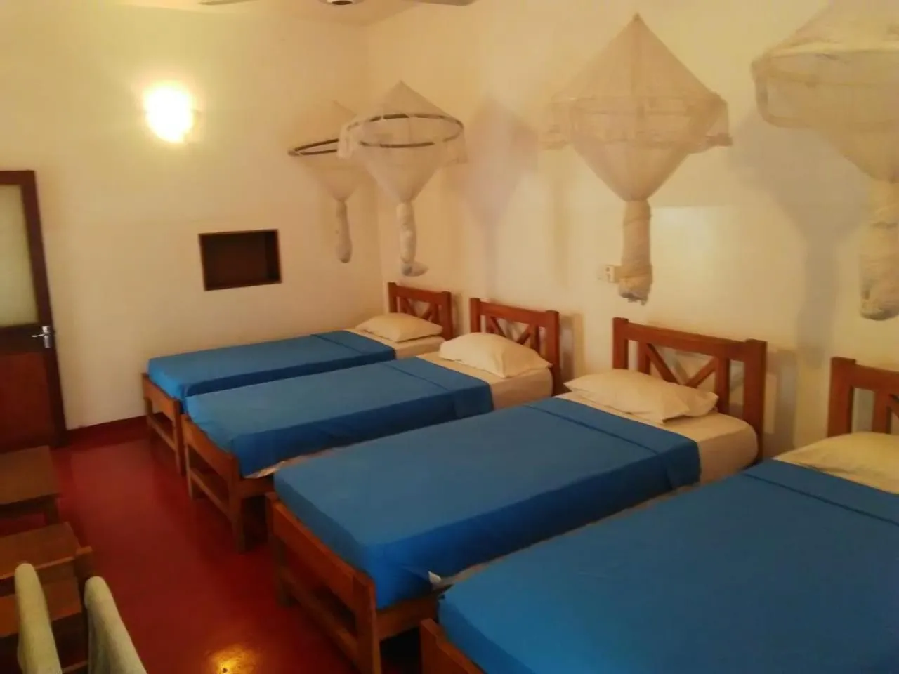 Bed in Hotel Mango Garden