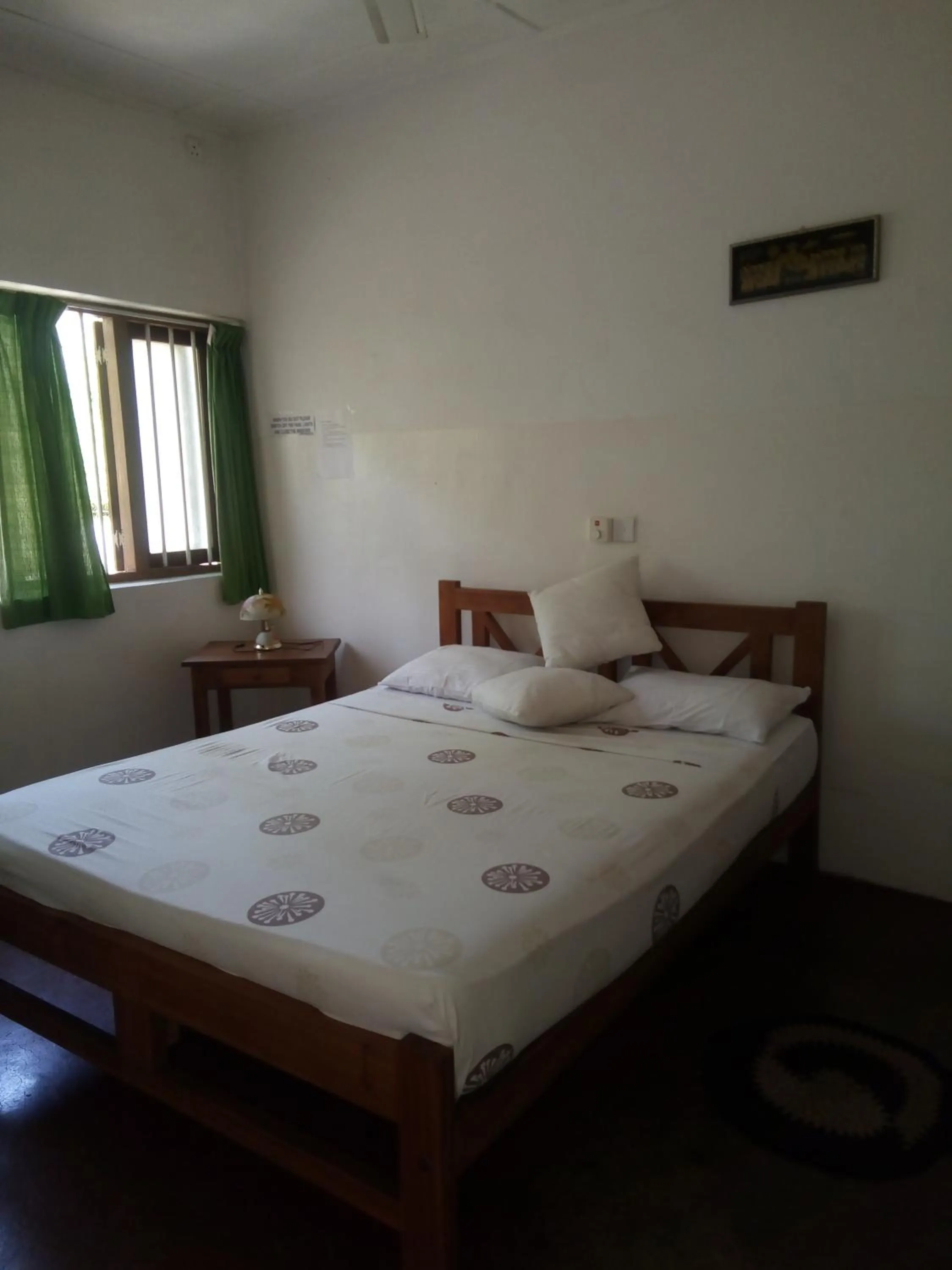 Bed in Hotel Mango Garden