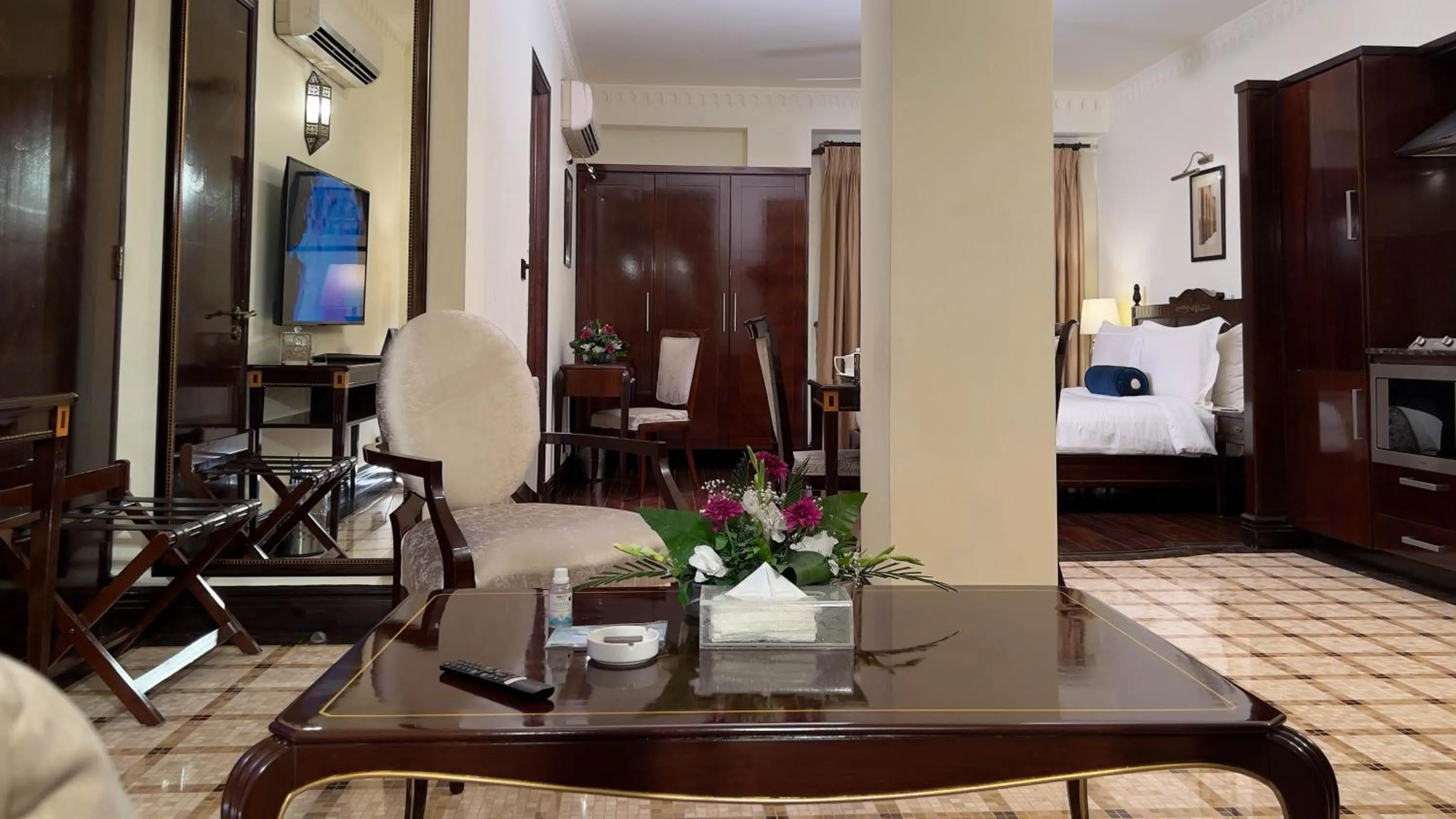 Bed in Heritage Luxury Suites All Suite Hotel