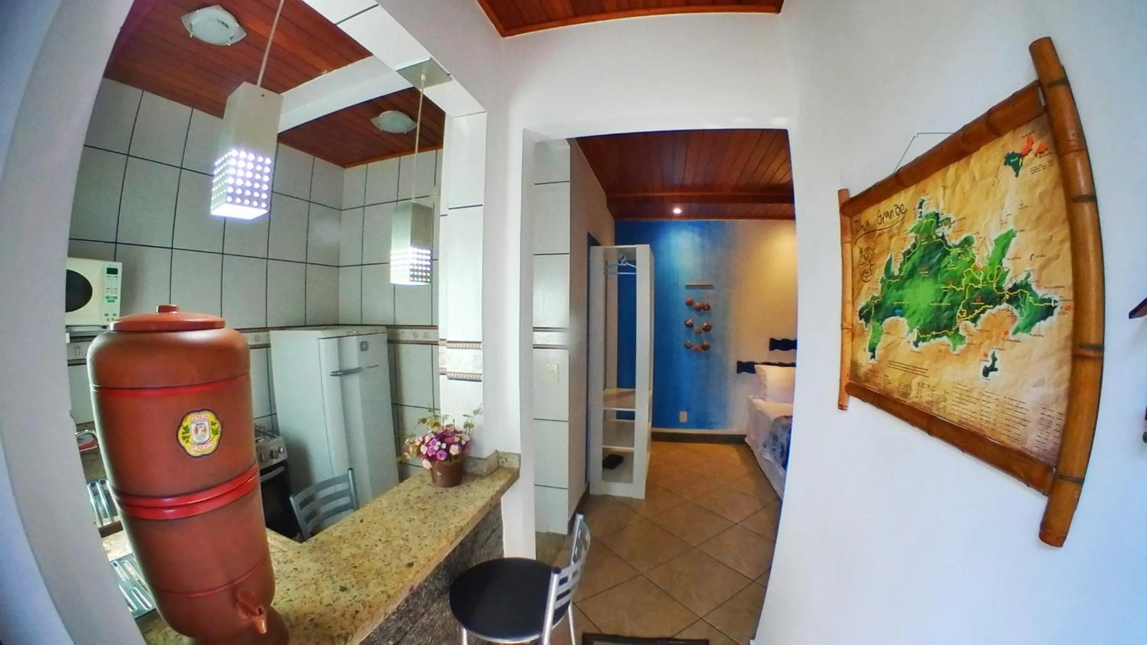 Kitchen or kitchenette in Raio de Sol pousada & camping