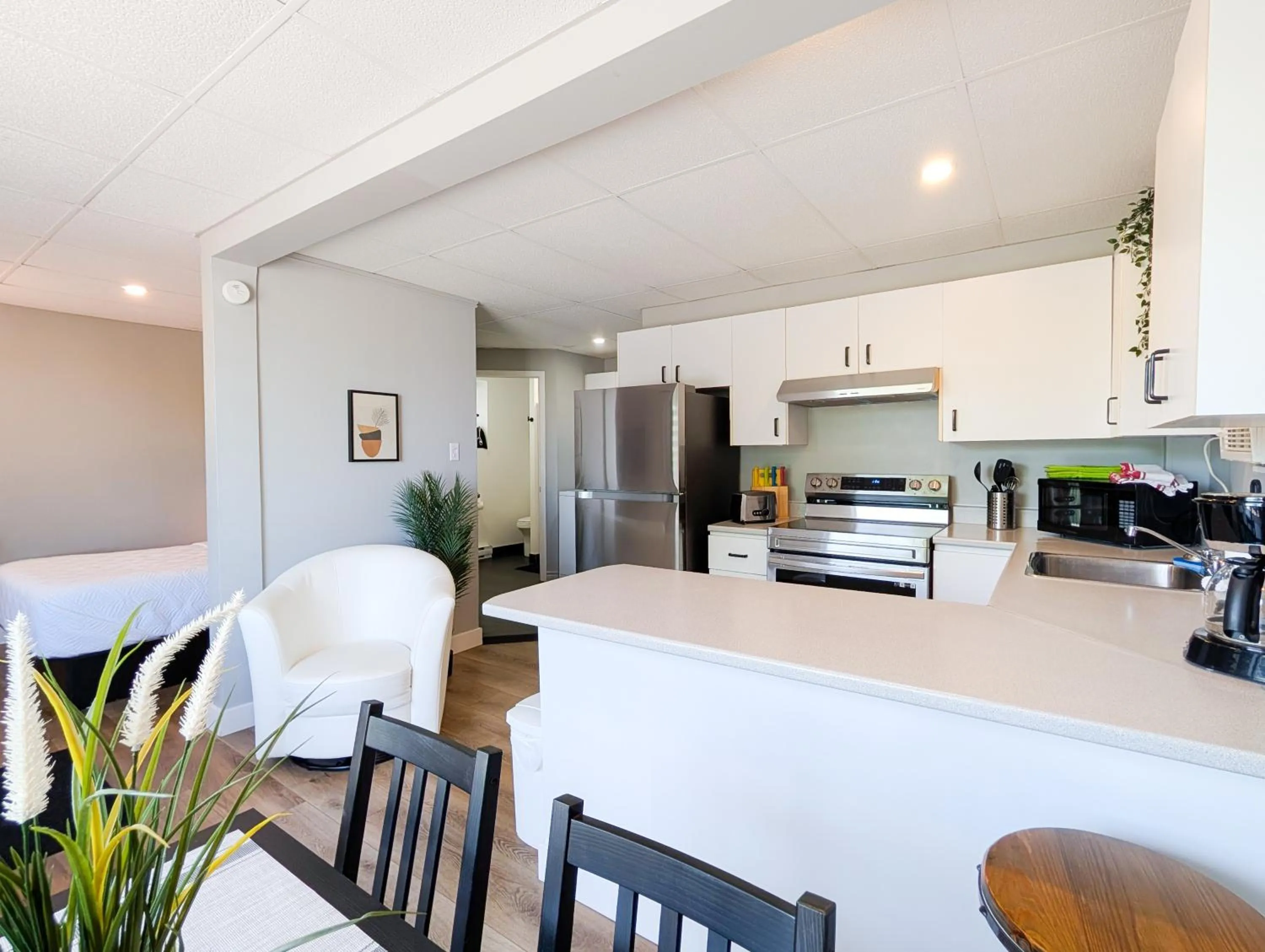 Kitchen or kitchenette in Hébergement Harvey