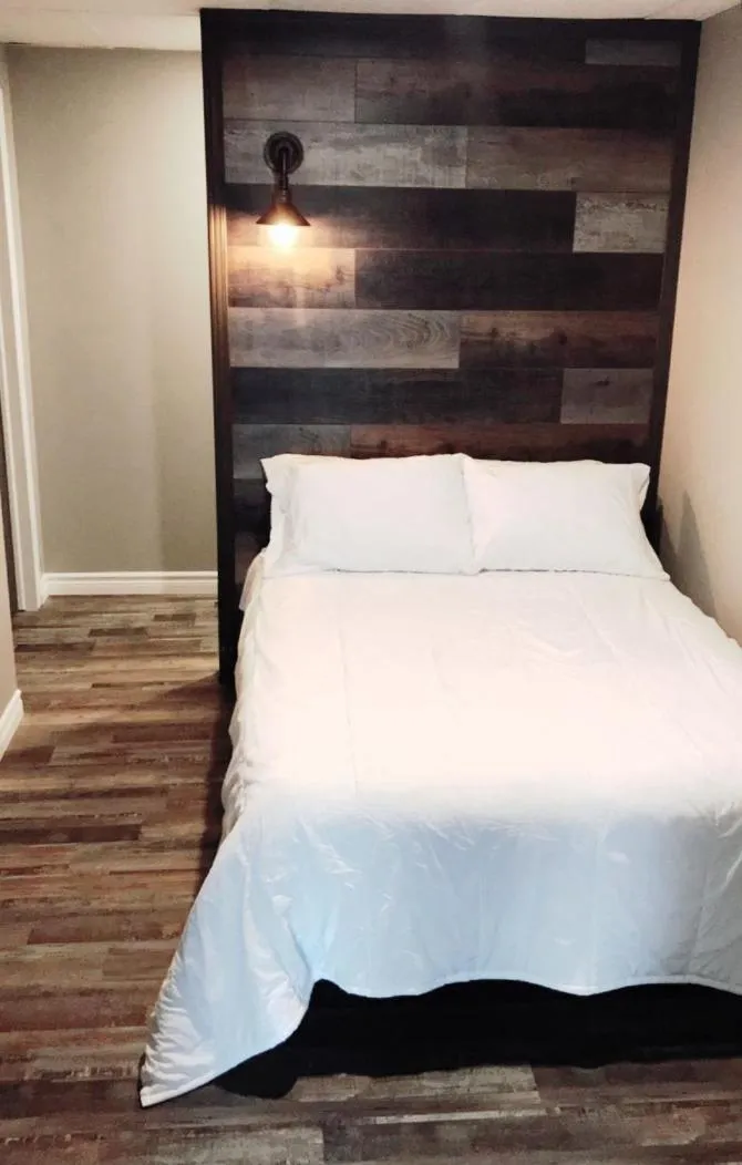 Bed in Hébergement Harvey