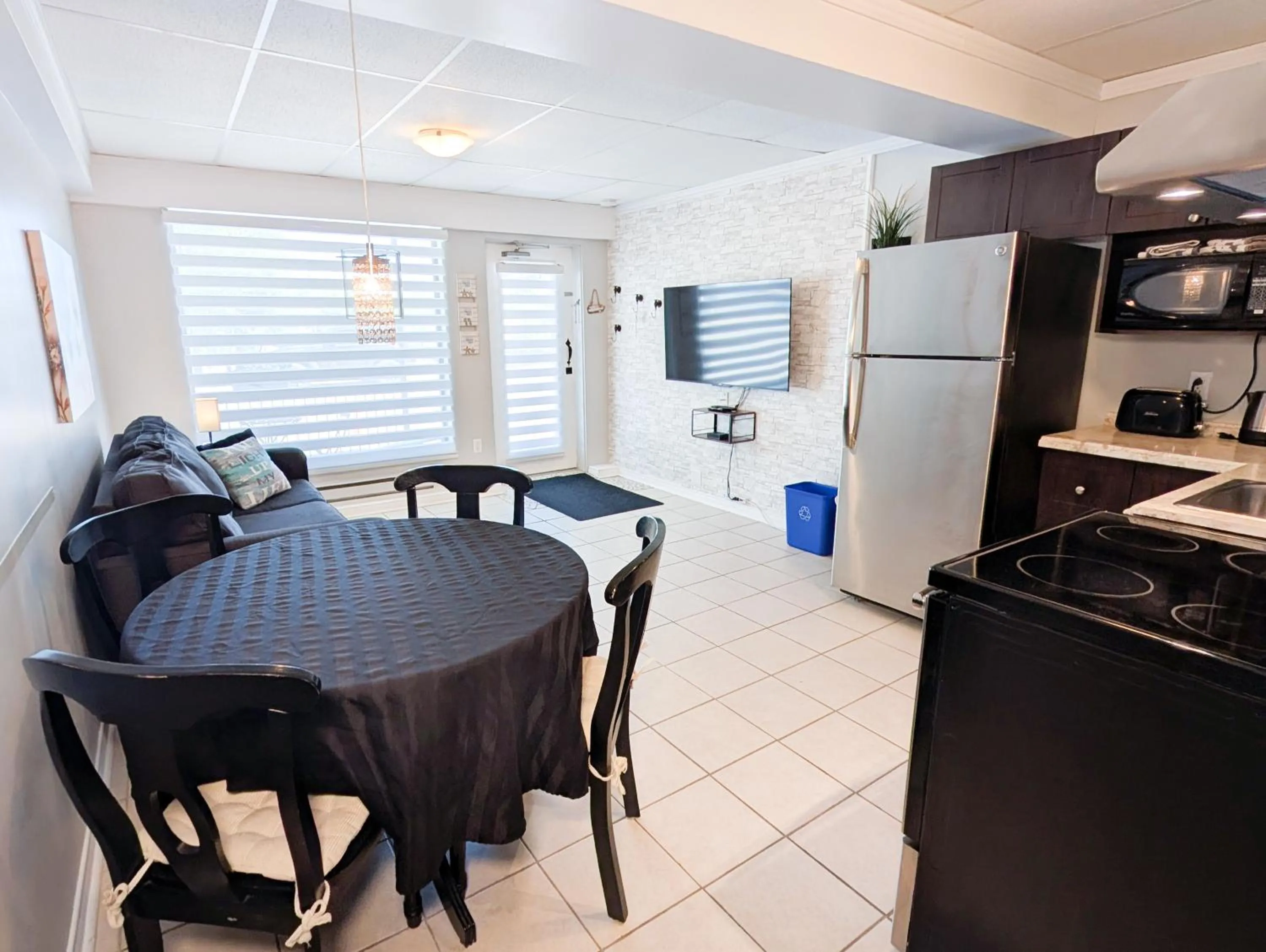 Kitchen or kitchenette in Hébergement Harvey