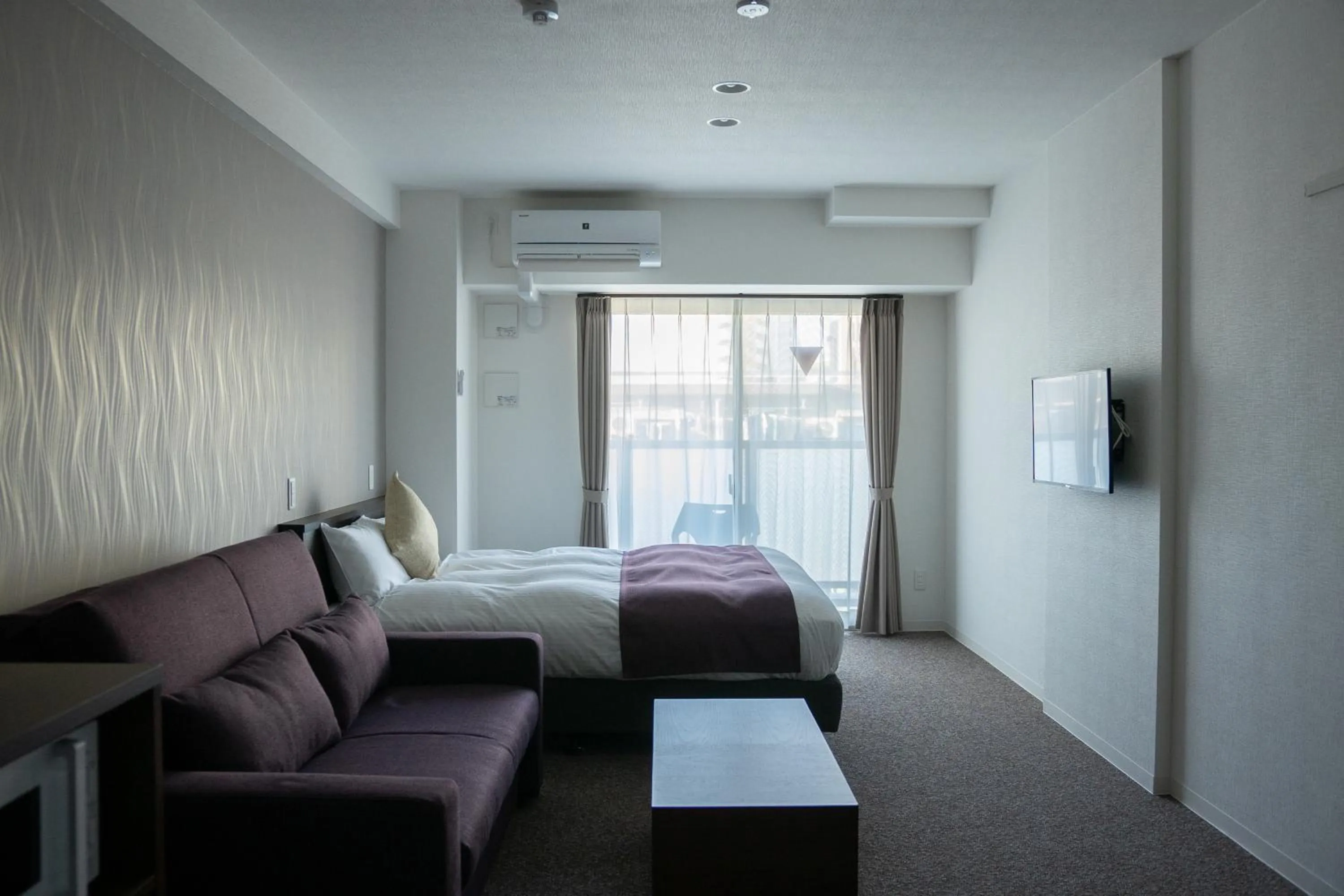 Photo of the whole room, Bed in Marina Sunrise Osaka Bay