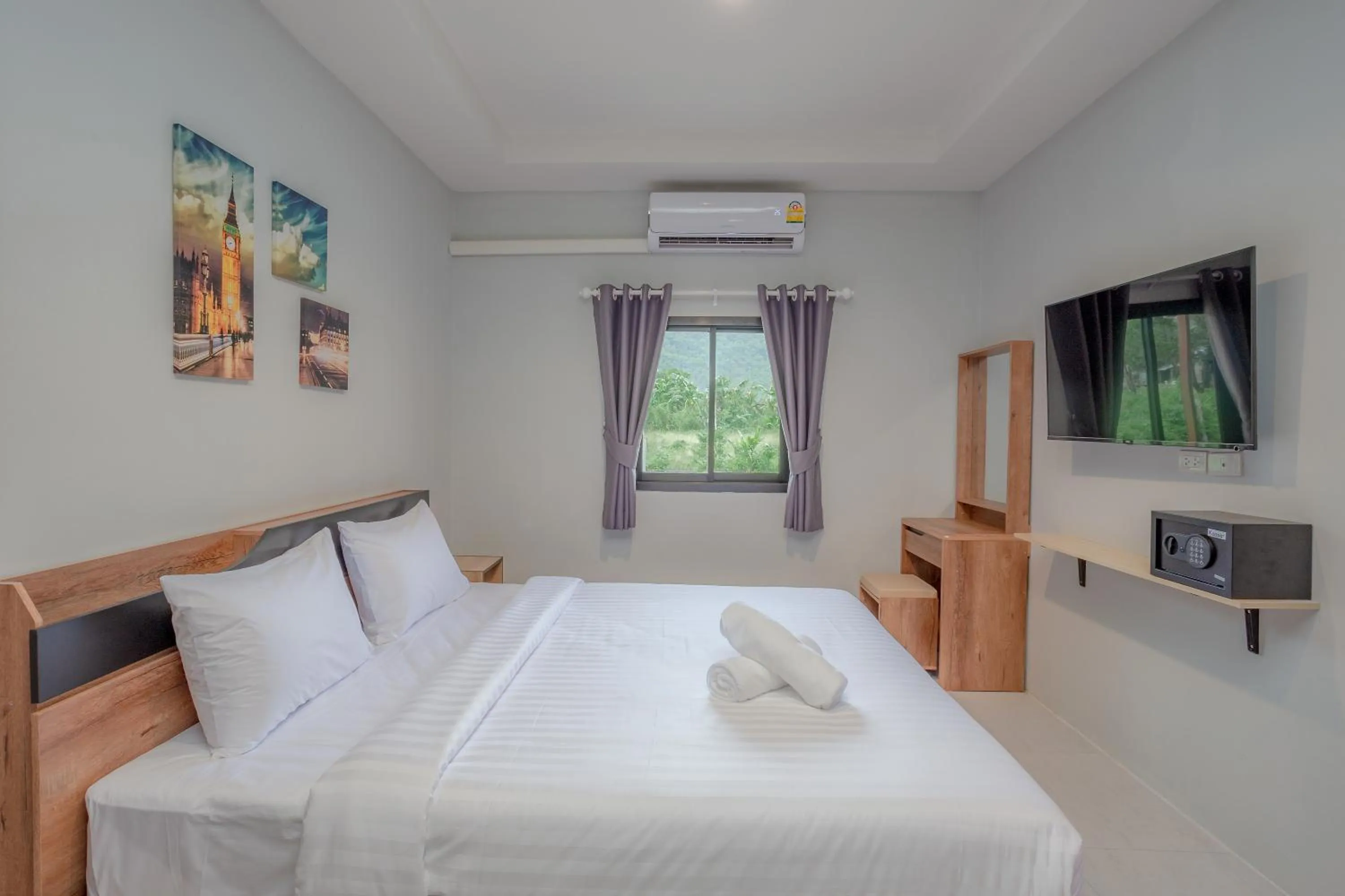 Bed in Malinee Resort