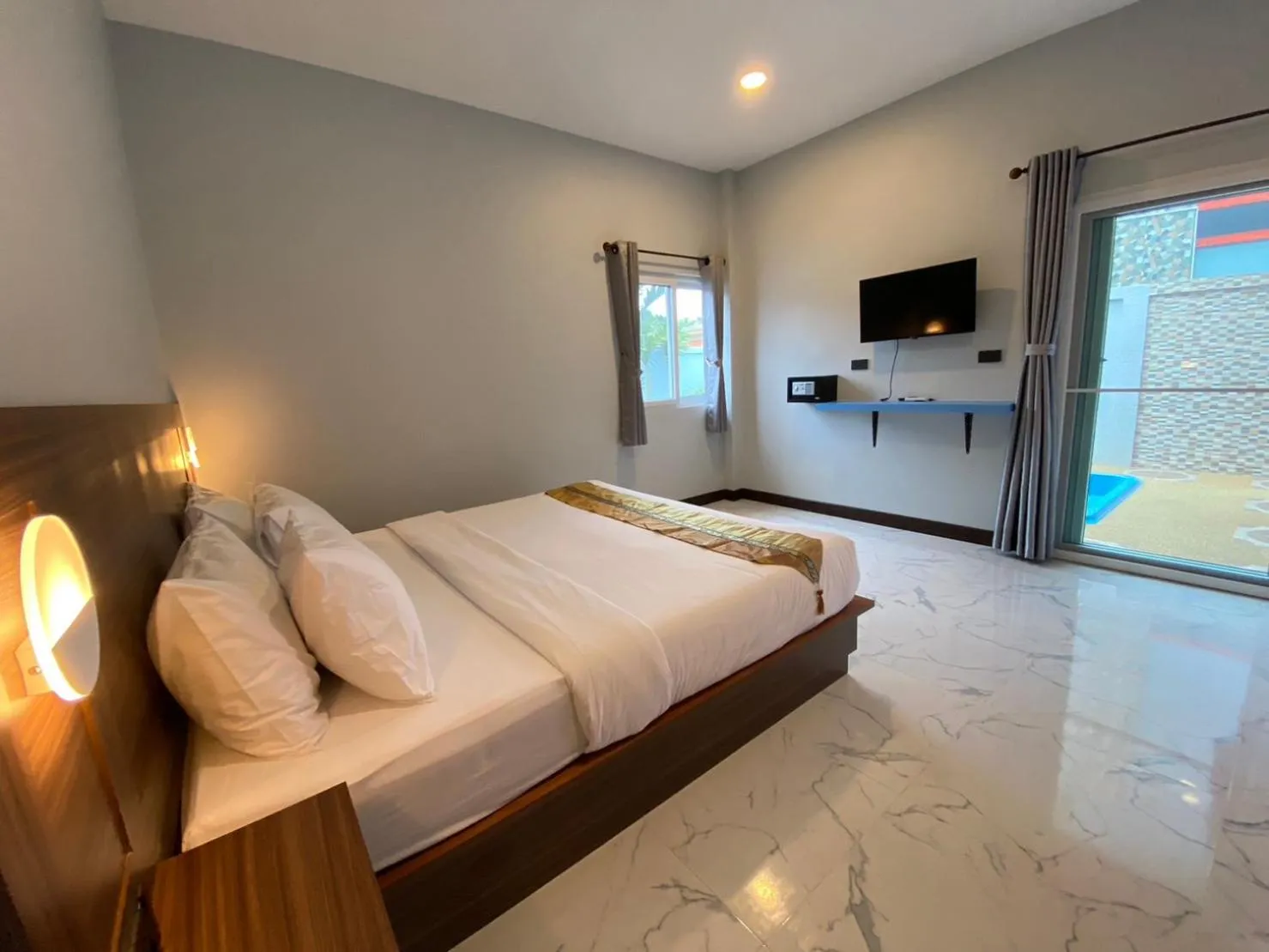 Bed in Blue Aura Pool Villa
