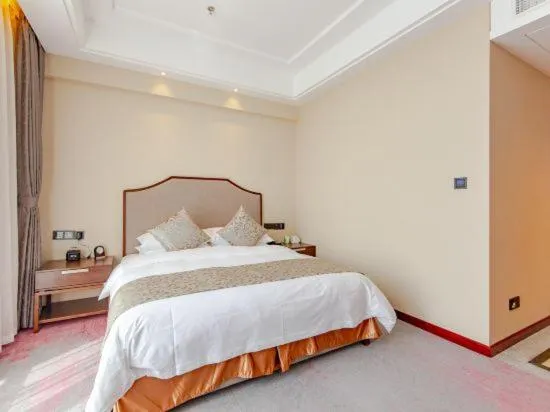 Bed in Binhai Jinling International Hotel