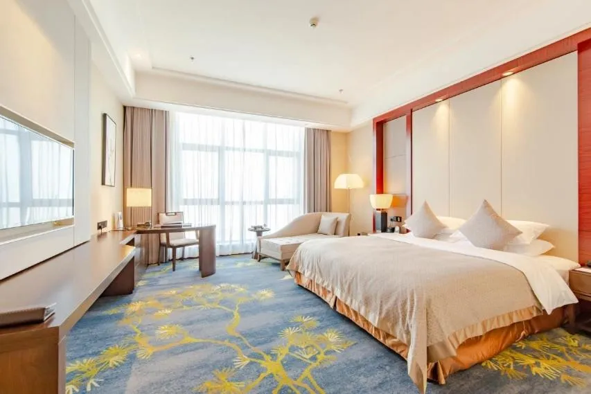 Bed in Binhai Jinling International Hotel