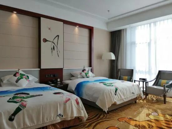 Bed in Binhai Jinling International Hotel